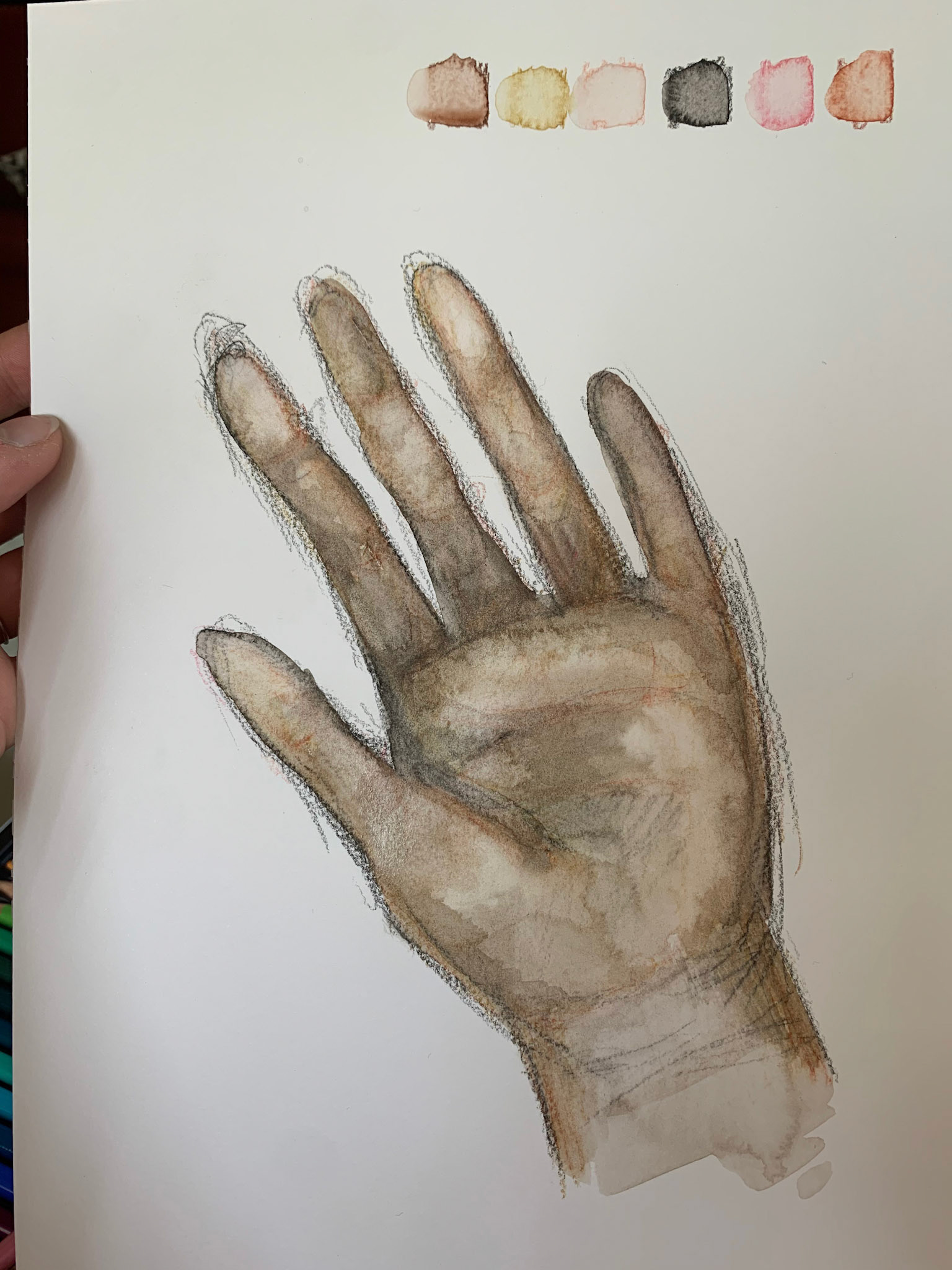 Proef hand met aquarelpotlood