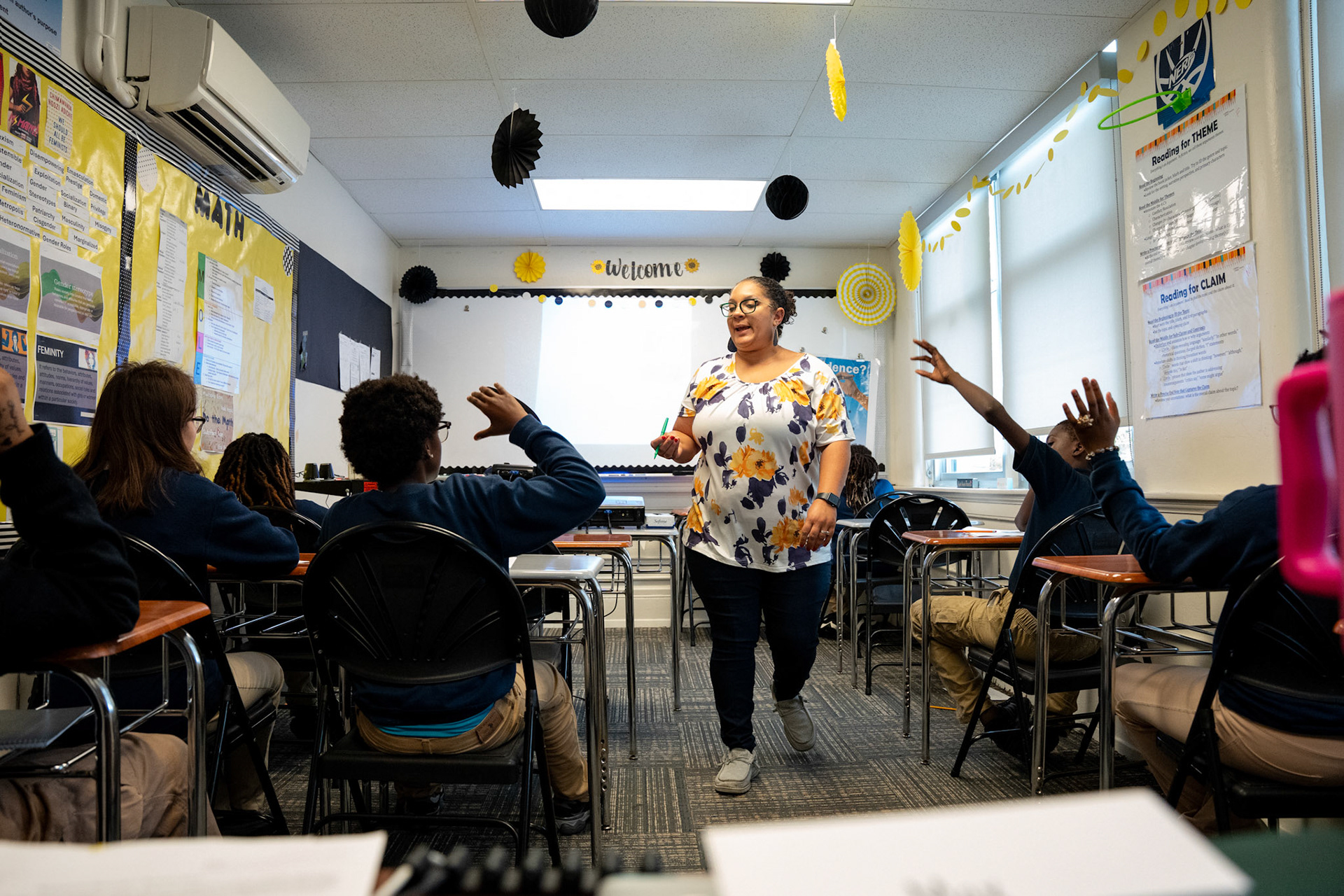 Special education English language arts students raise their hand for Amber Pollox-Quinn during her lesson, Sept. 26, 2024, in her Uncommon Schools Rochester Prep Chili Campus Middle School classroom in Rochester, N.Y. Pollox-Quinn keeps her lesson’s very engaging for her students.