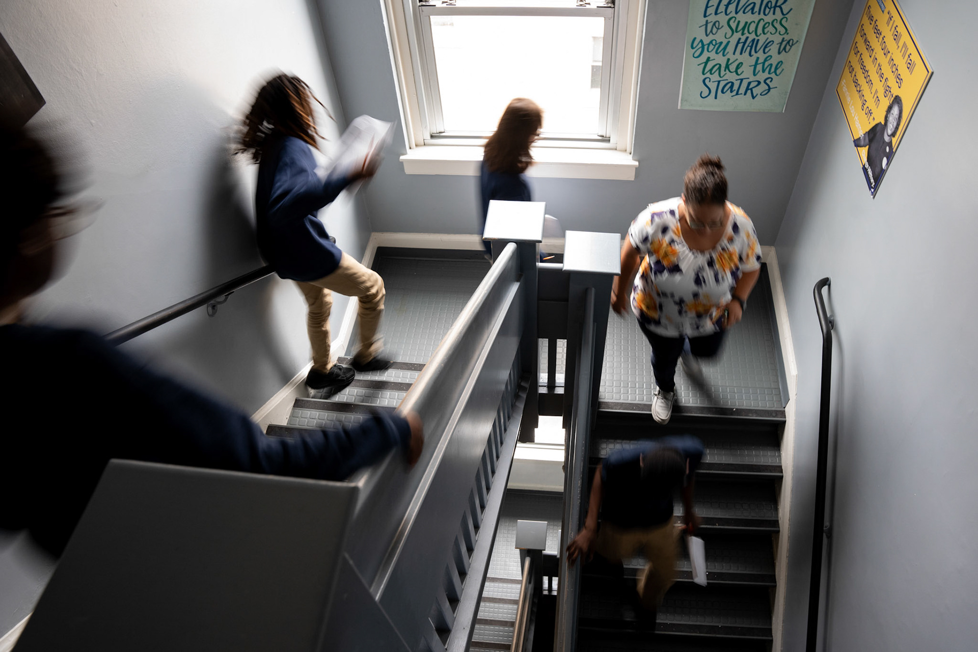 Amber Pollox-Quinn walks her special education English language arts students back to their general education classroom after her lesson, Sept. 26, 2024, on the campus of Uncommon Schools Rochester Prep Chili Campus Middle School in Rochester, N.Y. Special education classes are held in classrooms on the top floor, nicknamed the “tower.”