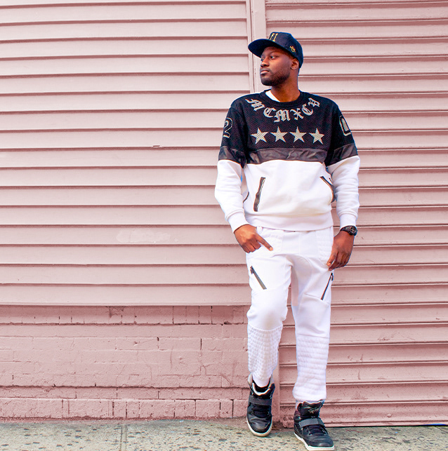 Randy posing in urban hip hop fashion