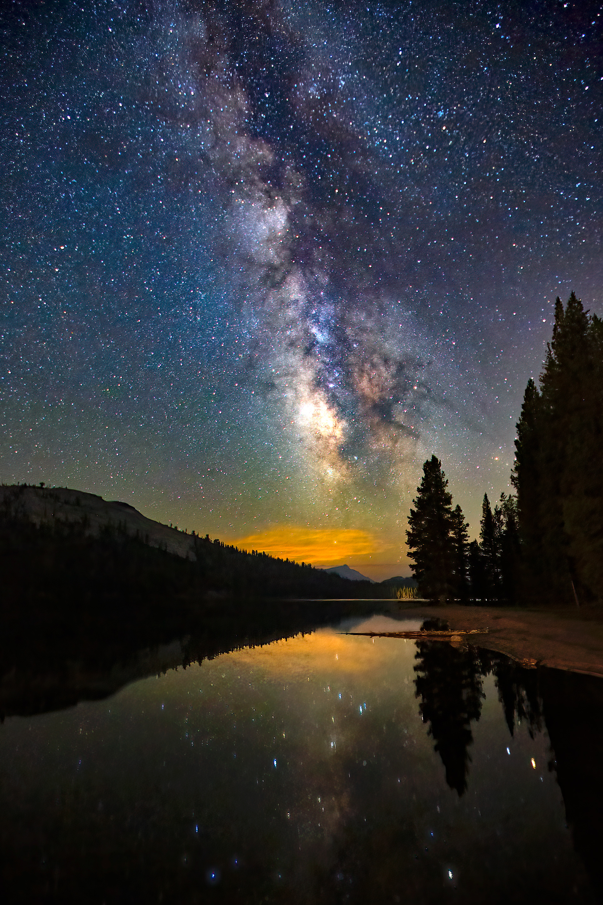 Milky Way reflected in Tenaya Lake, Yosemite National Park, California