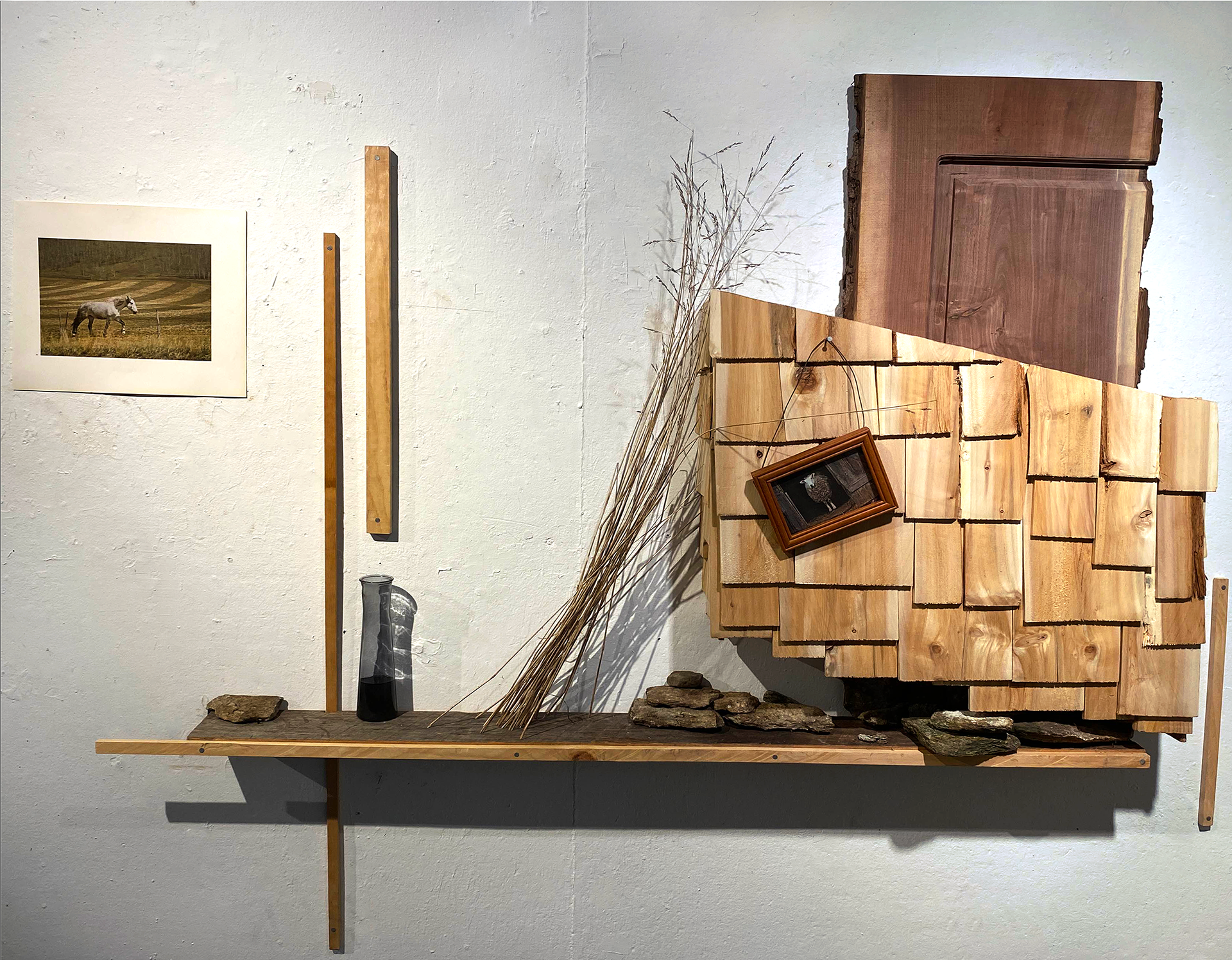 Living room, 2025. Wood, stone, found materials