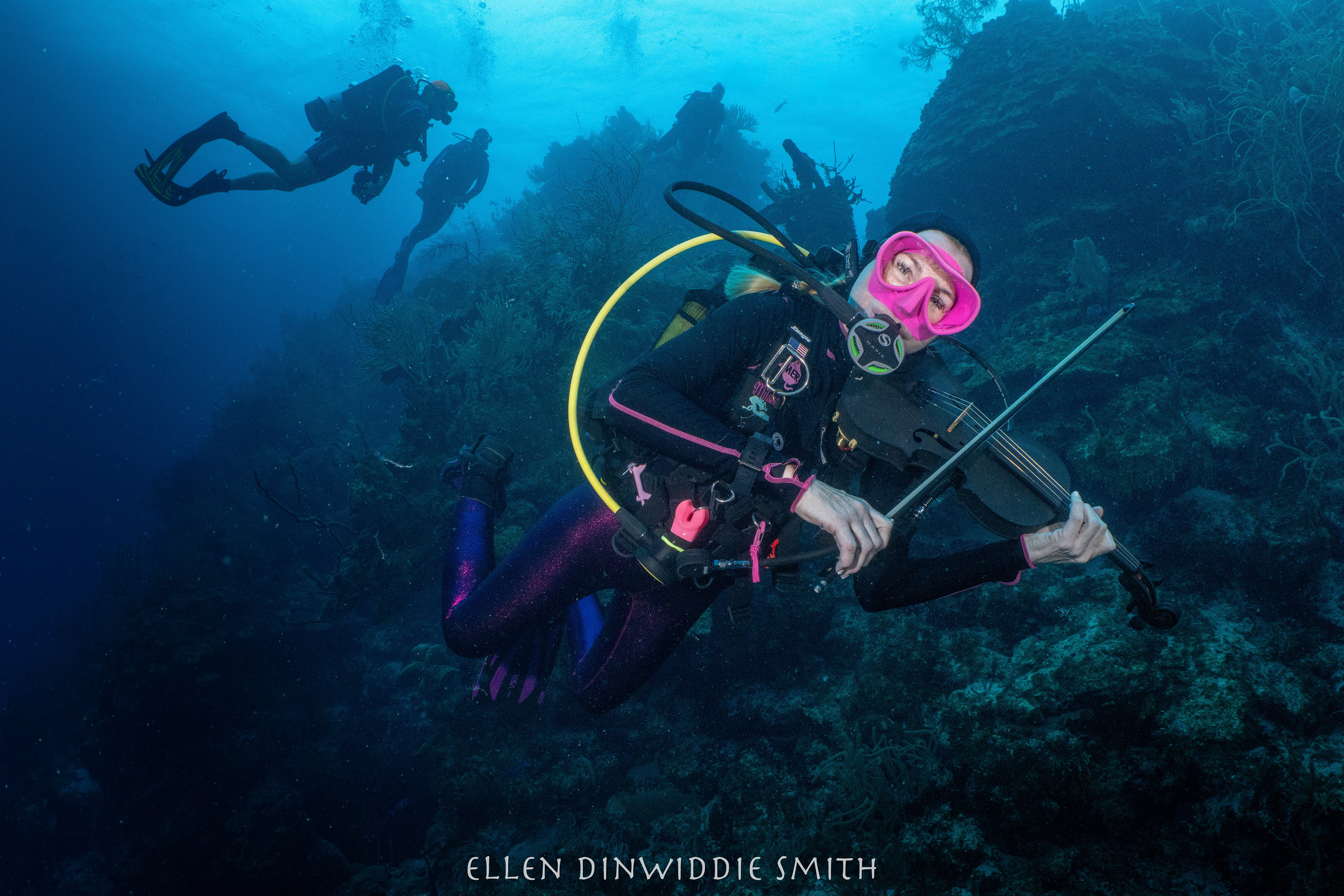 Celebrating her 100th dive with a violin serenade!