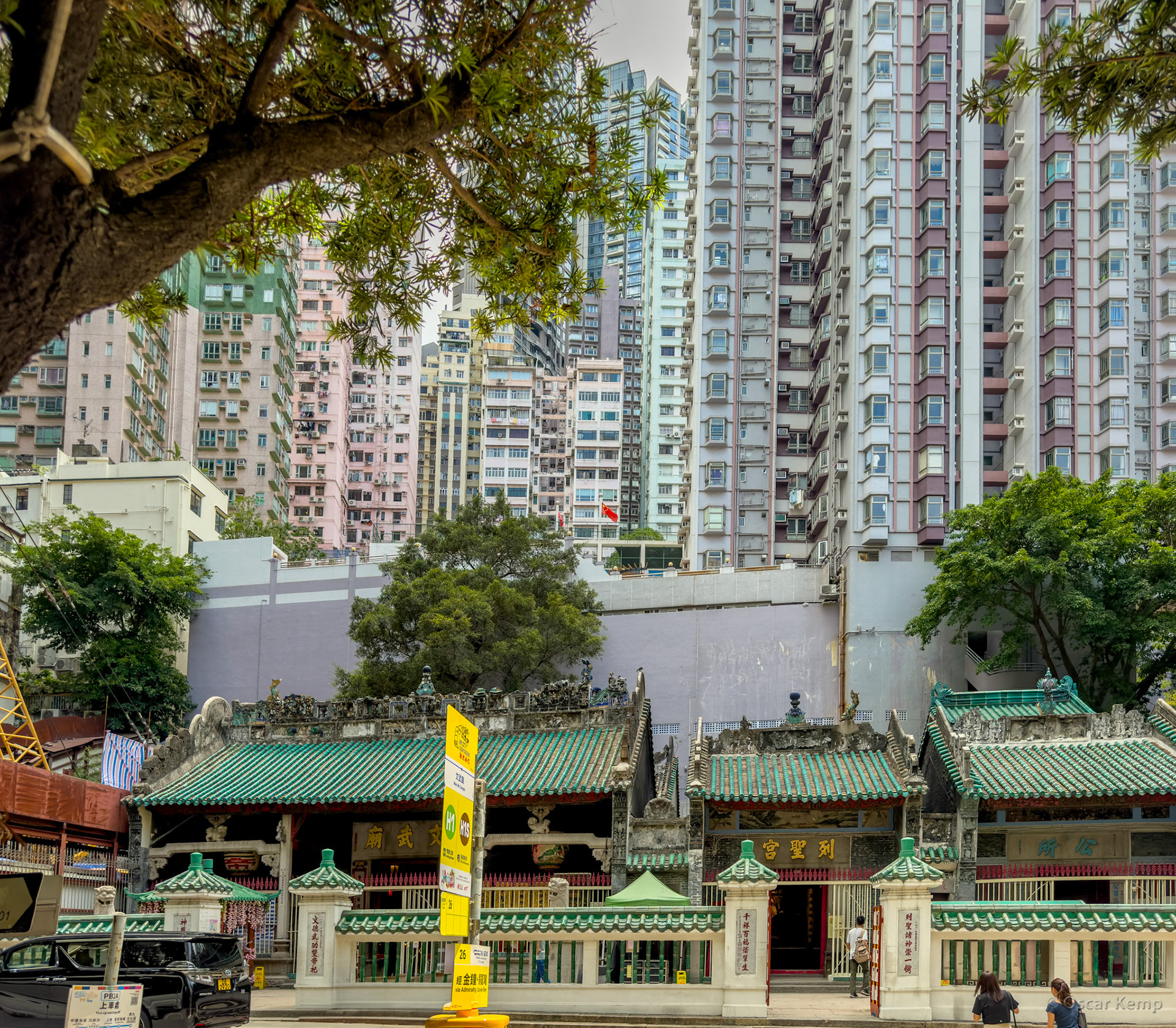 Hollywood Road / Man Mo Temple against a backdrop of tall residential towers [China, 2025 05]