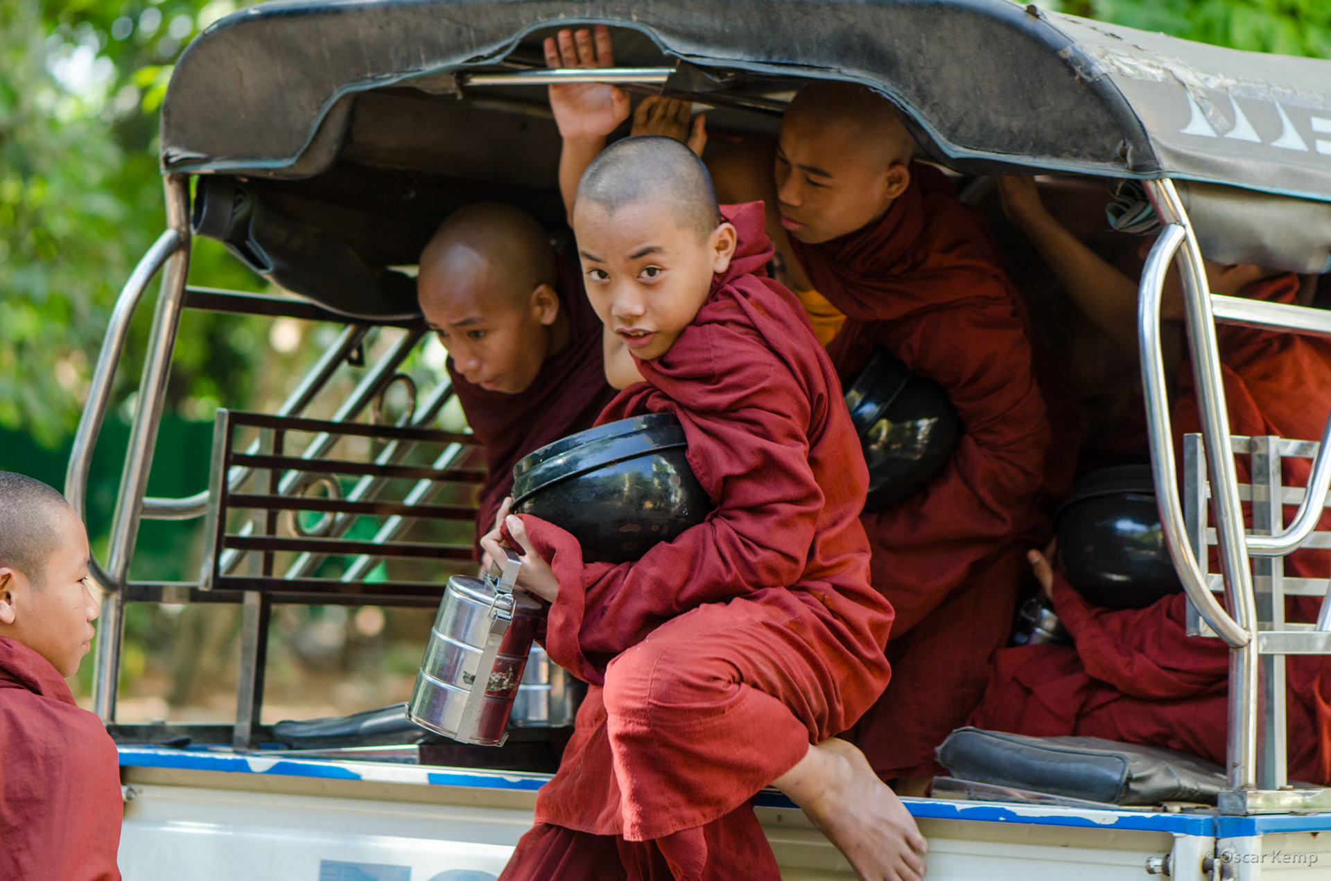 Kalaywa Monastery / Young bhikkhus (Buddhist monk) with tiffin carriers and alms bowl [Myanmar, 2012 01]