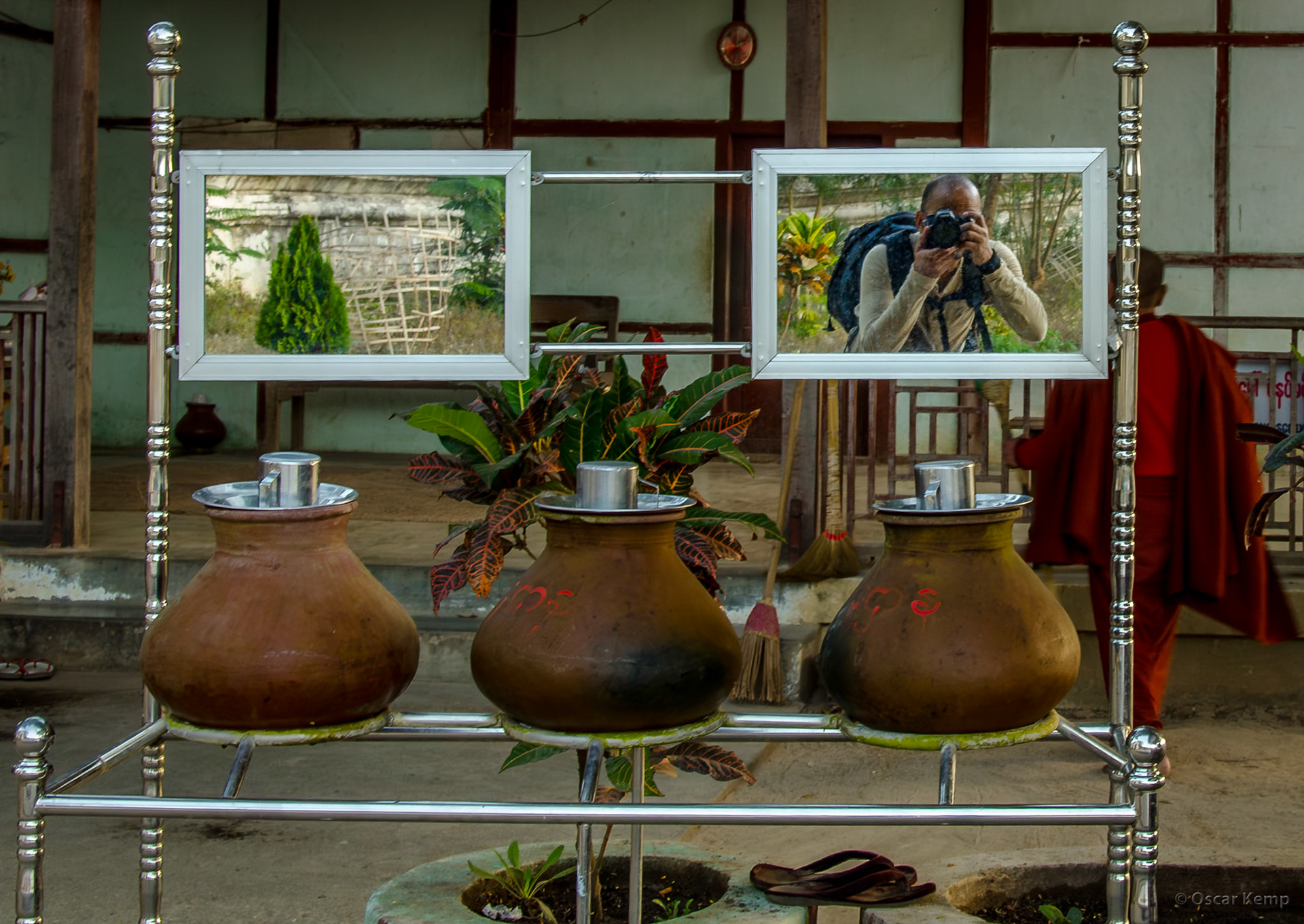 Min Kun near Mingun Pahtodawgyi Stupa / Selfie in the mirror of an open-air 'washing basin' with 3 cooling jars [Myanmar, 2012 01]