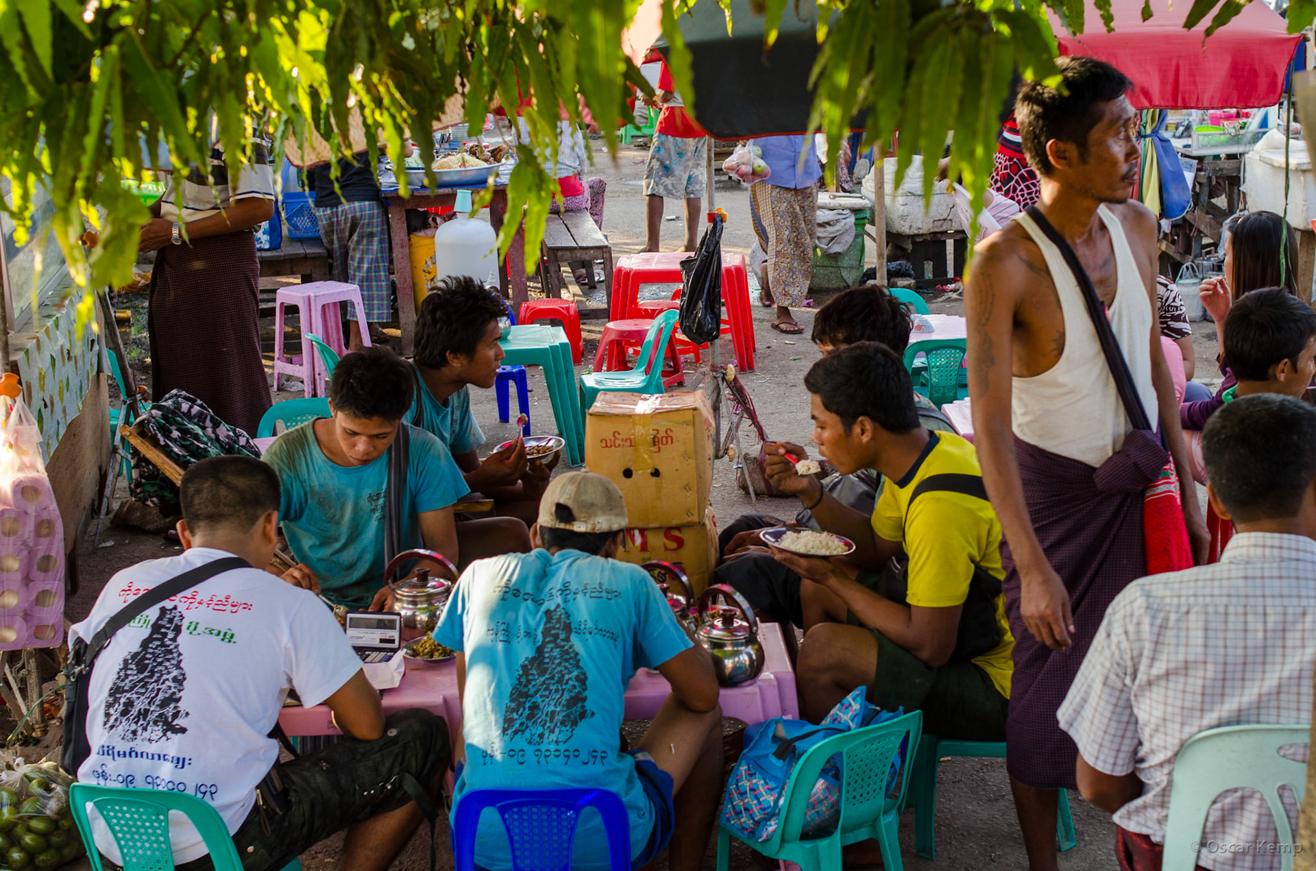 Strand Road / Men's section of an open-air restaurant [Myanmar, 2012 01]