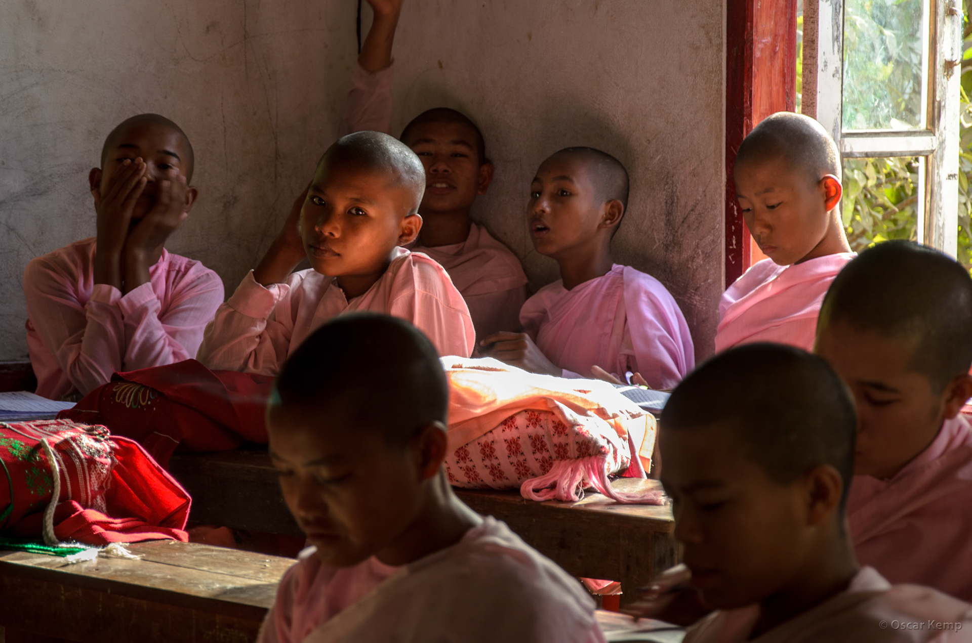 near Shun Oo Pu Nya Shin Pagoda / School class with distracted young Bhikkhunīs (Buddhist nuns) [Myanmar, 2012 01]