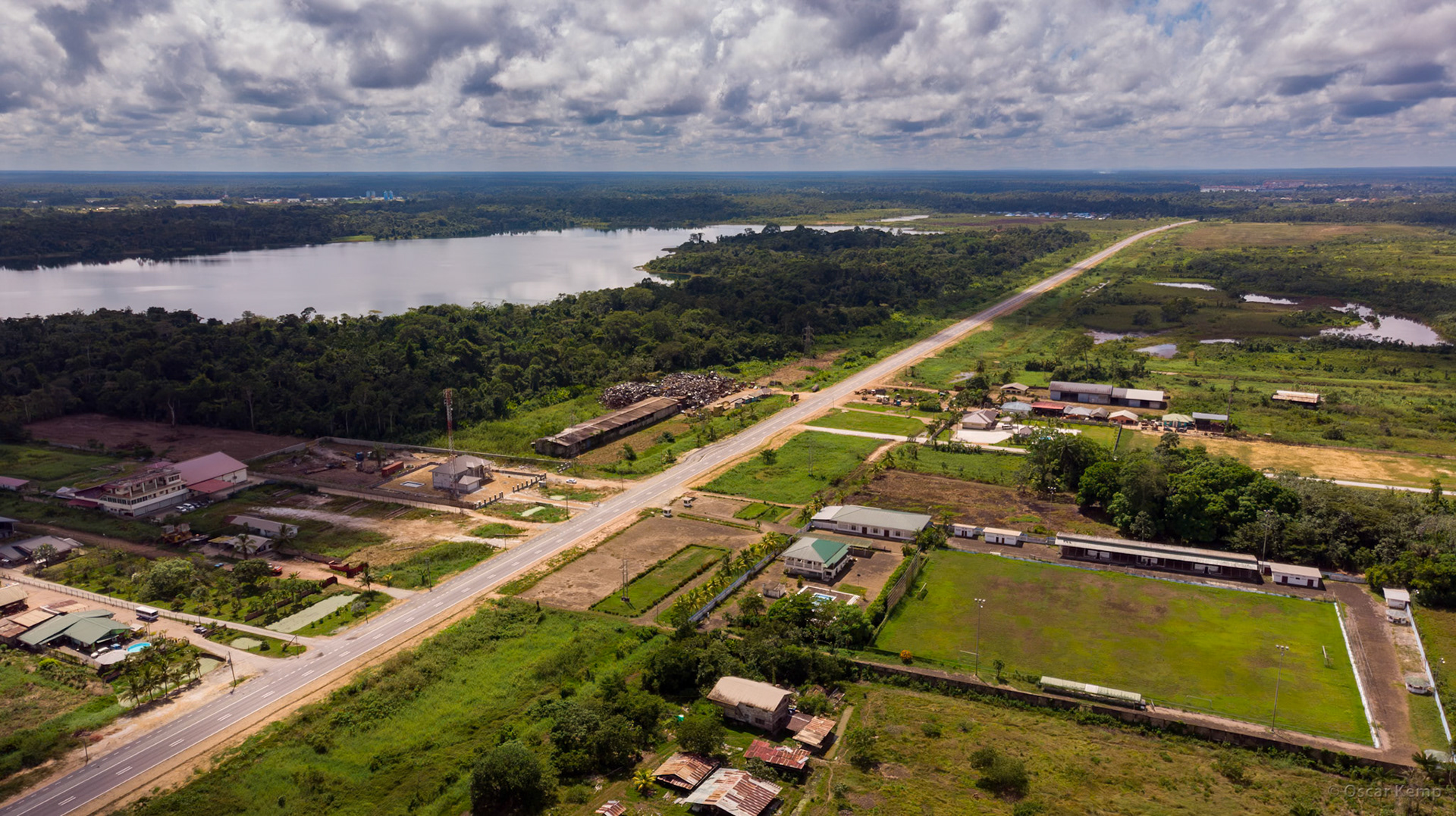 Martin Luther Kingweg aka Highway / Drone photo with Suriname Rivier (left) and Seedorf Stadium (right) [Suriname, 2019 10]