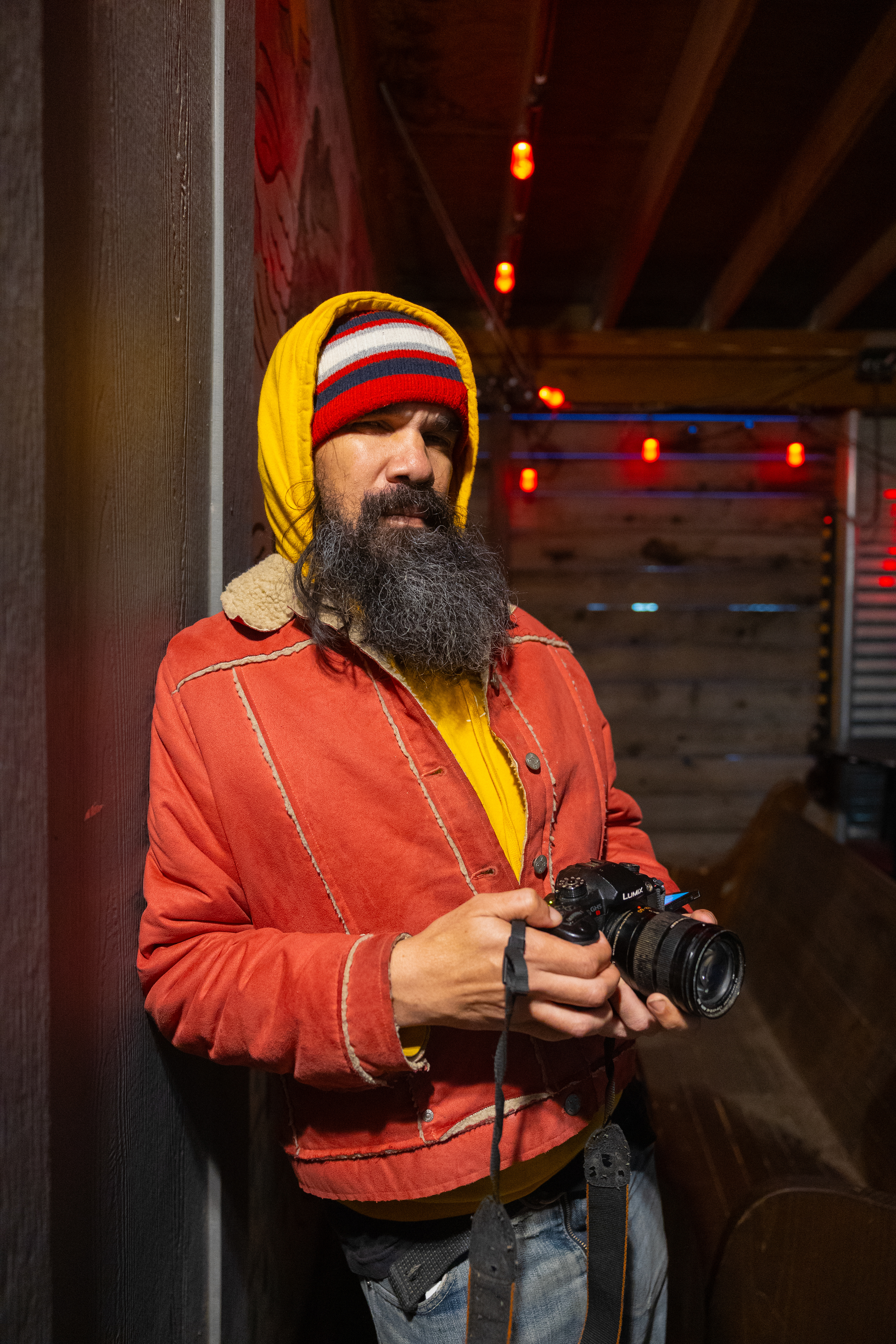 Larry King, a videographer for Rubber Gloves Rehearsal Studio poses for a portrait before he records the band Ducks Ltd.
