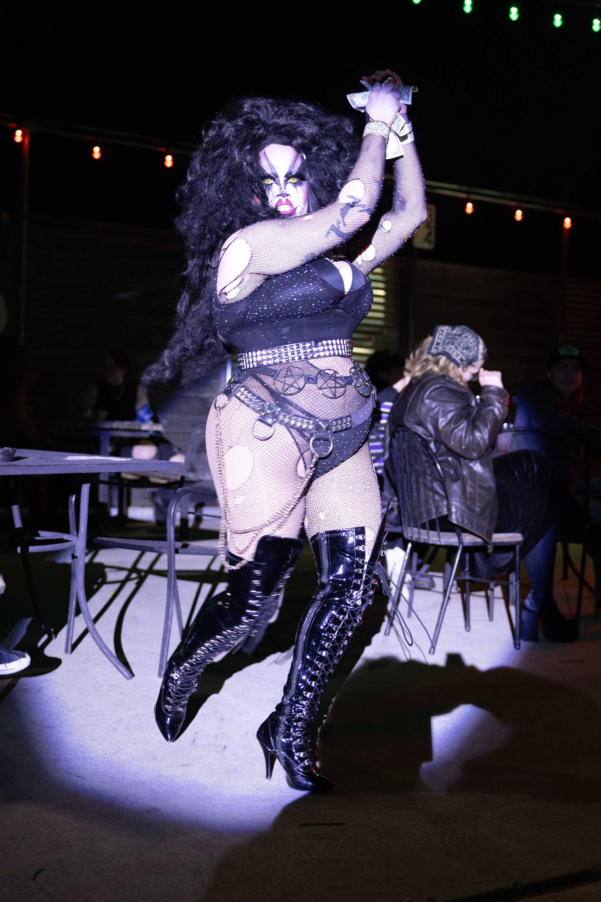 Venus Doom snakes through the crowd during their performance at Glitterbomb’s weekly show at Rubber Gloves Rehearsal Studio on March 6. They were collecting tips and trying to dance with and jump-scare their audience.