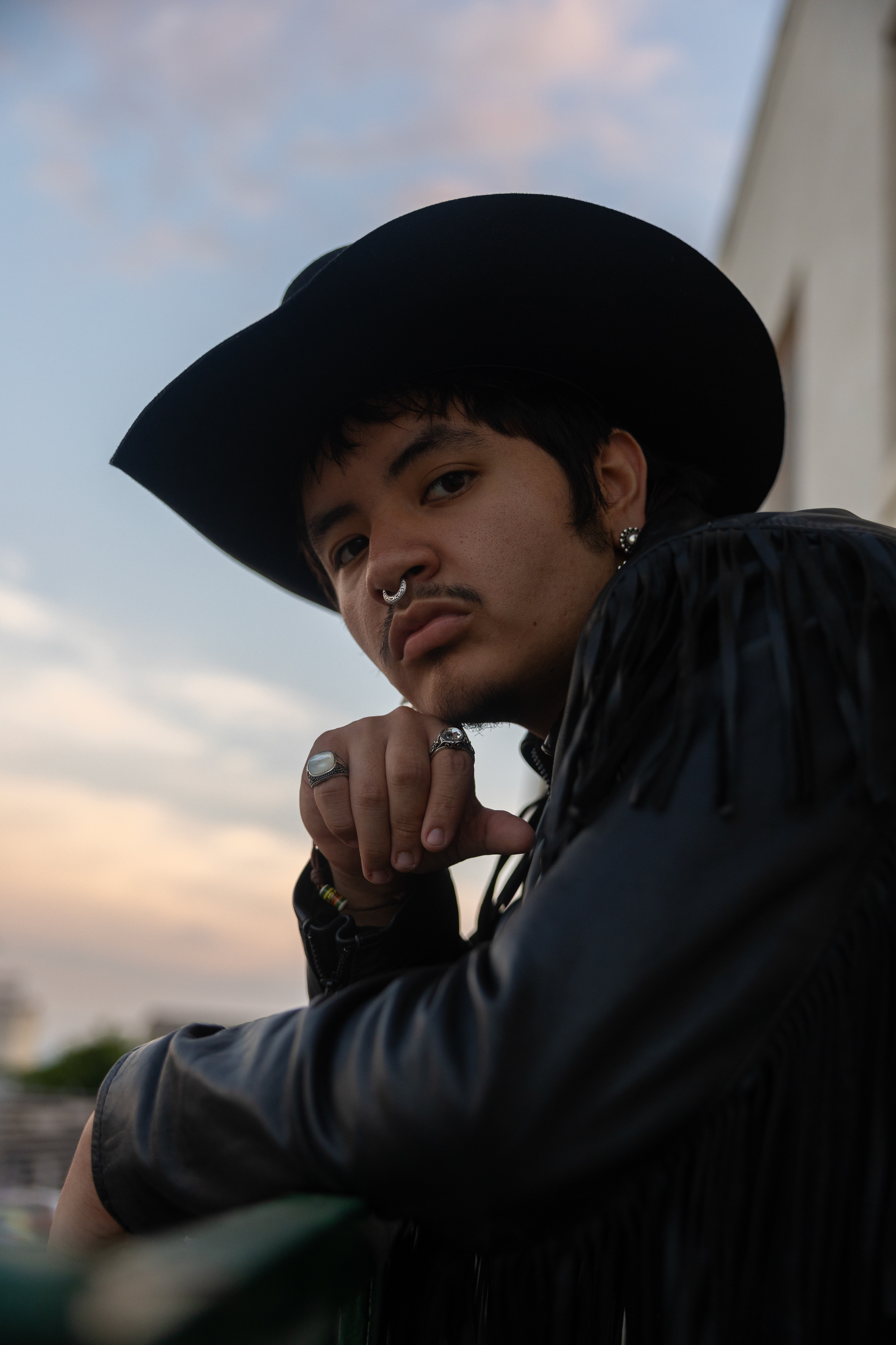 In a nod to both heritage and individuality, Damar Patiño marks his 2024 graduation with a portrait session rooted in alternative western aesthetics.