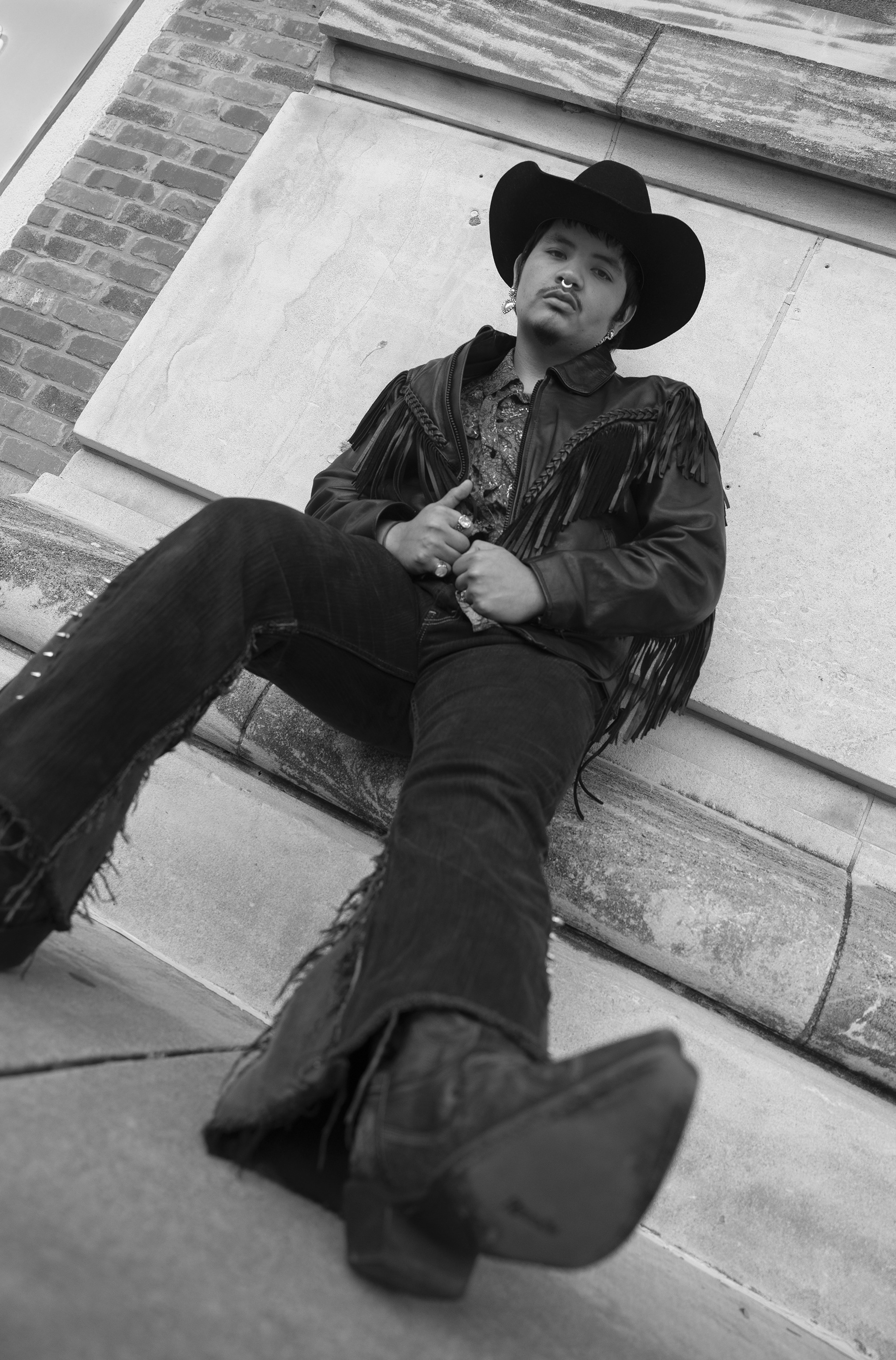 Graduating with a degree in Fashion Merchandising, Damar Patiño brings a distinct sense of style to his milestone moment. This portrait series, photographed in 2024, blends western influences with a modern edge to reflect his vision for the future of fashion.