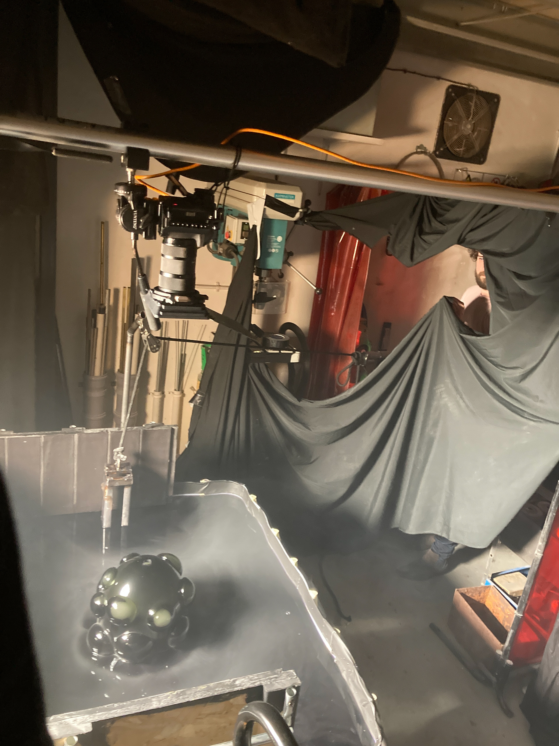 A complicated process is in the making as a lamp base emerges from a pool of slime on set at the Porta Romana 35th anniversary film.