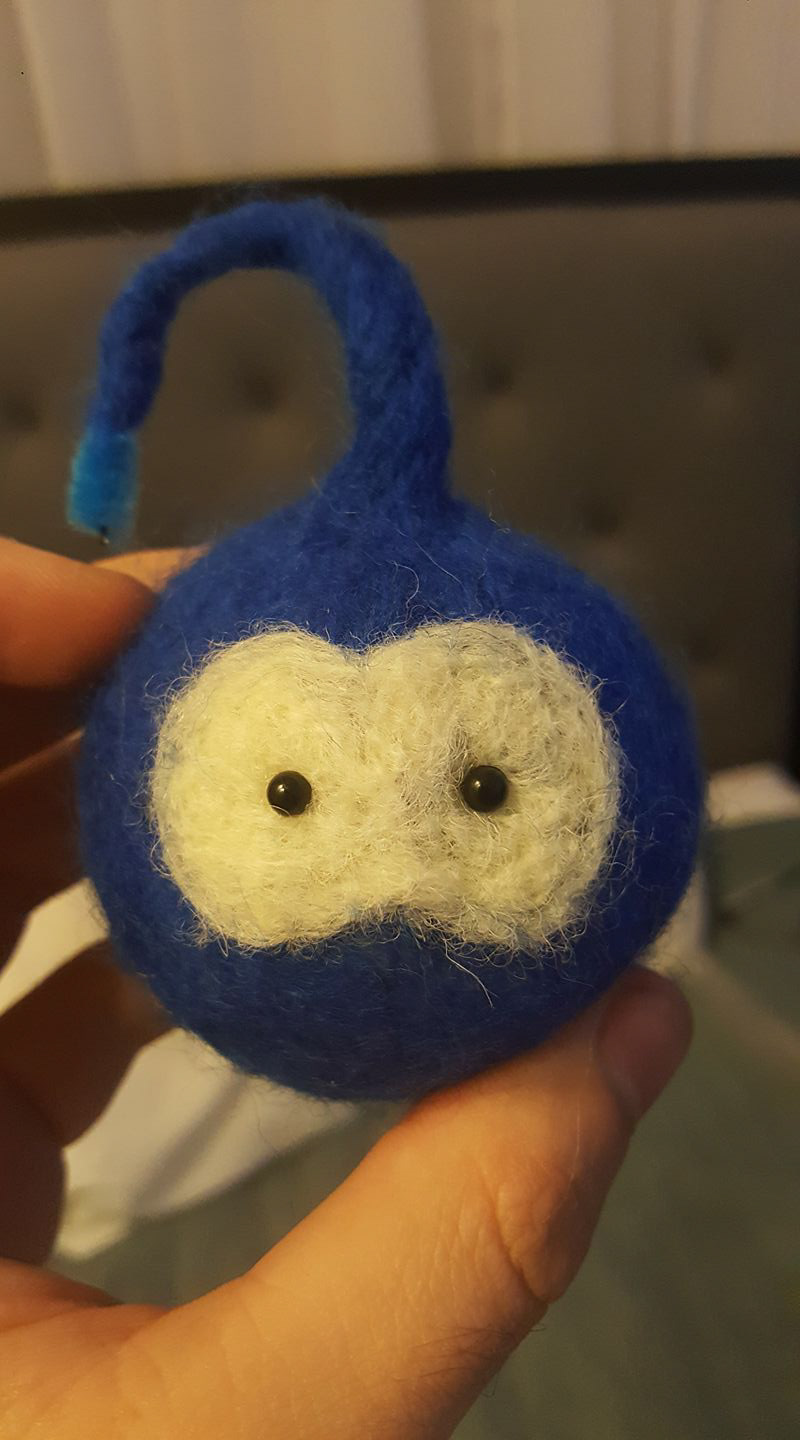 Handmade felted SpokeIt characters embedded with magnets and antenna pipe cleaners