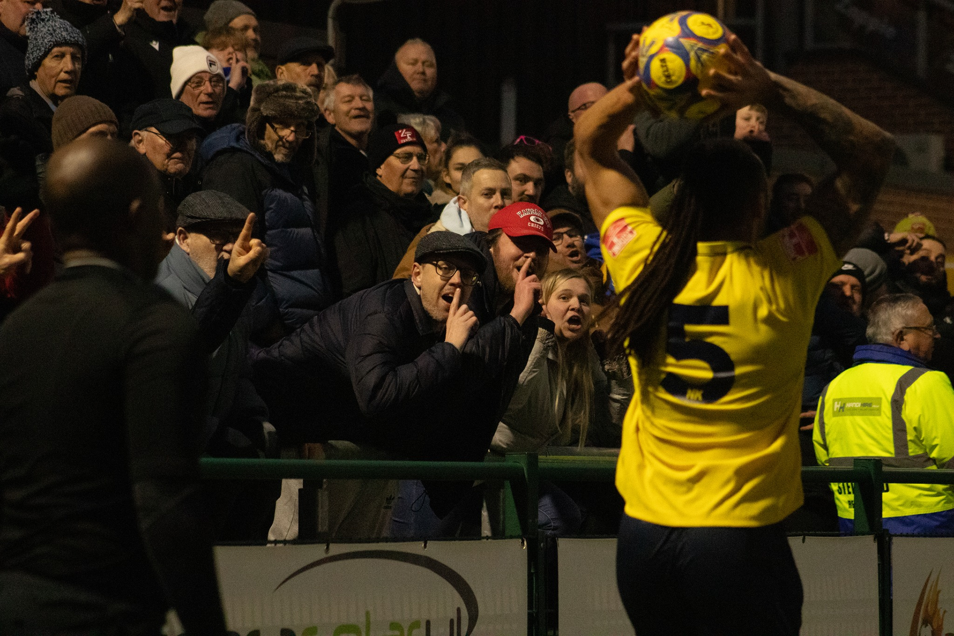 AFC Totton fans "Shh" a Gosport Borough player.