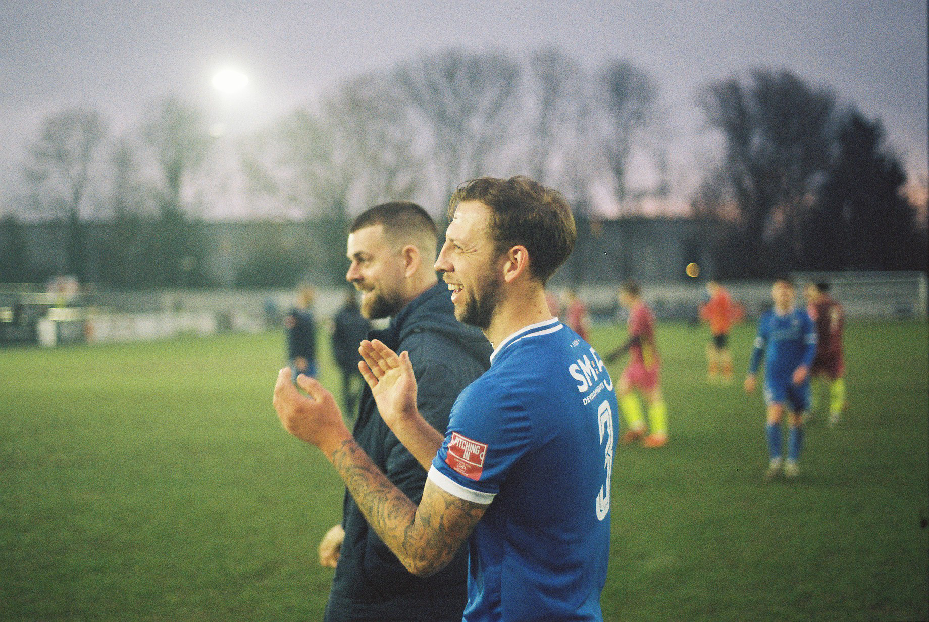Ben Jefford claps the fans alongside Sam Magri.
