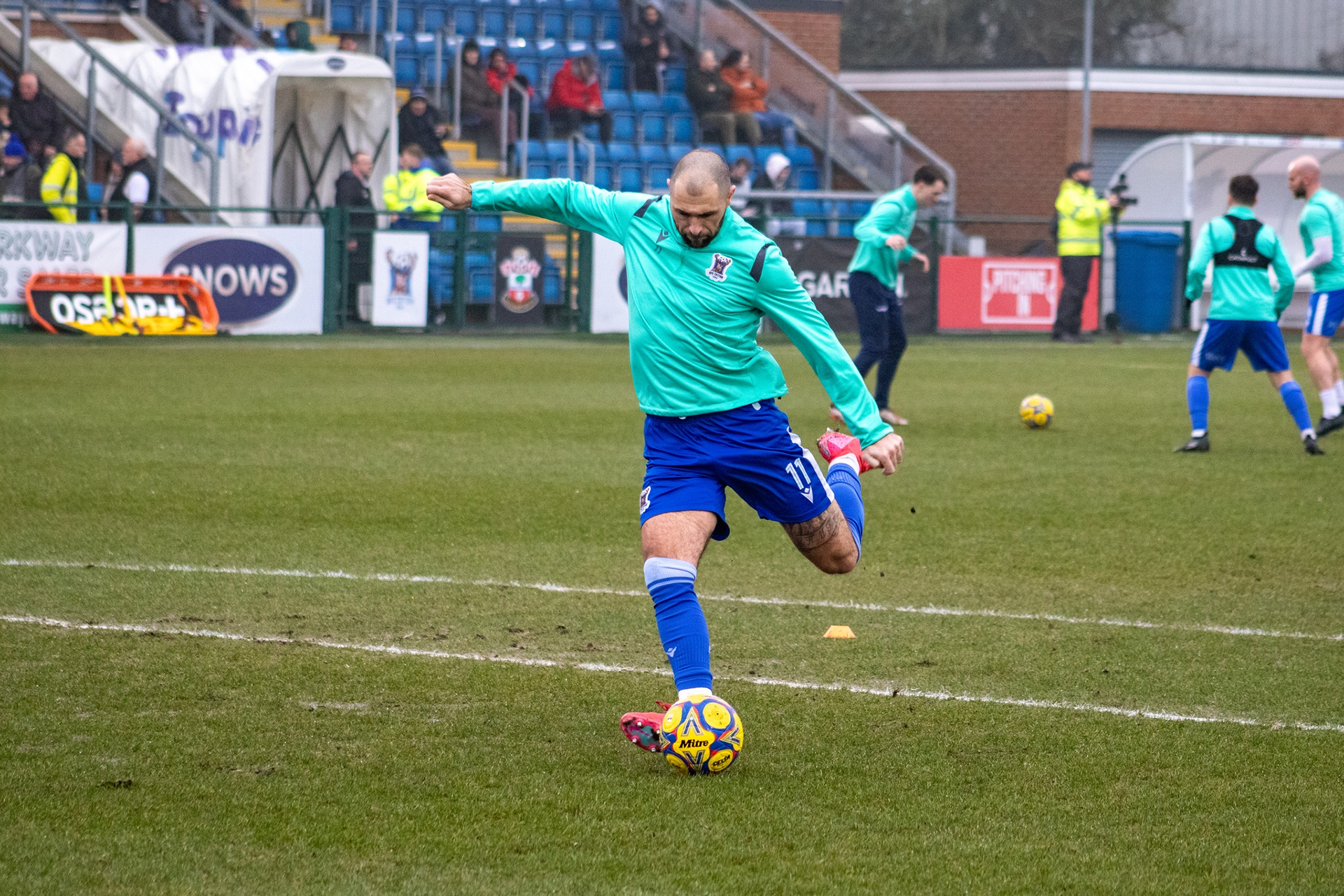 Charlie Austin shoots in the pre-match warmup.