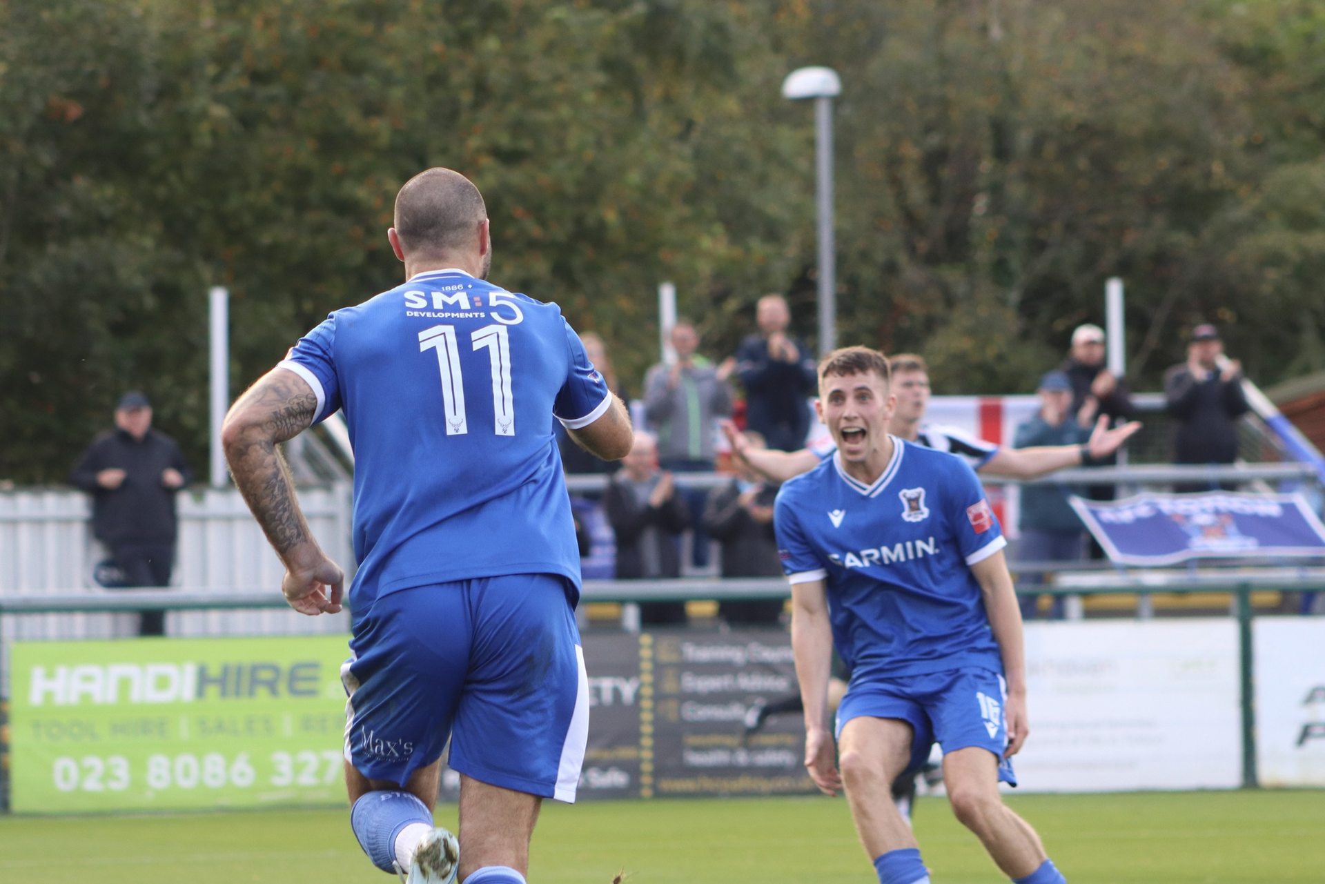 Charlie Austin celebrates his goal with Luke Bennett.