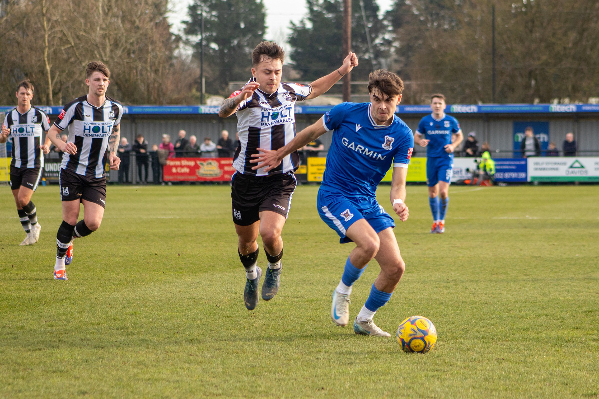 Richard McIntyre shields the ball.