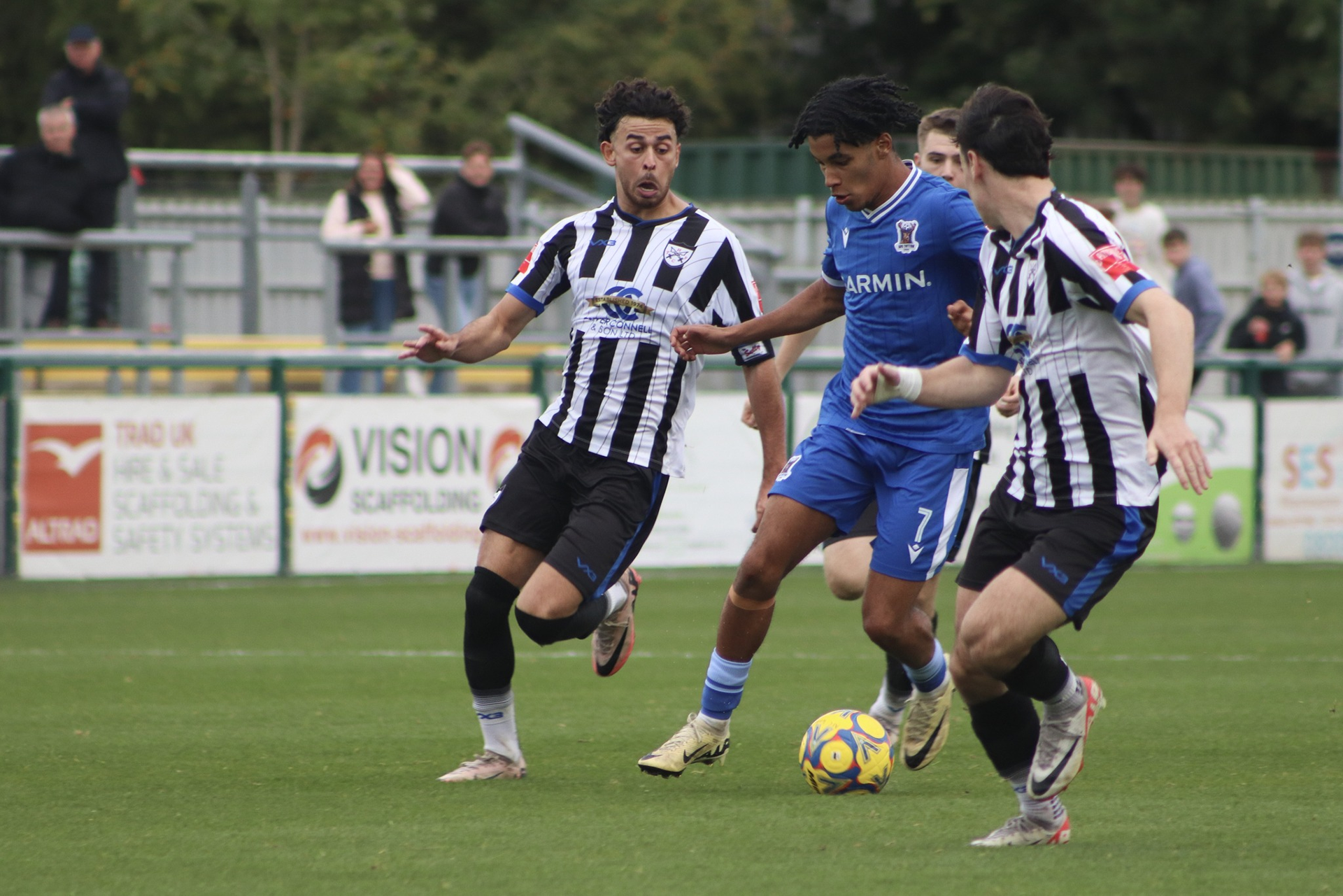 Ashley Clarke takes on a couple Hanwell defenders.