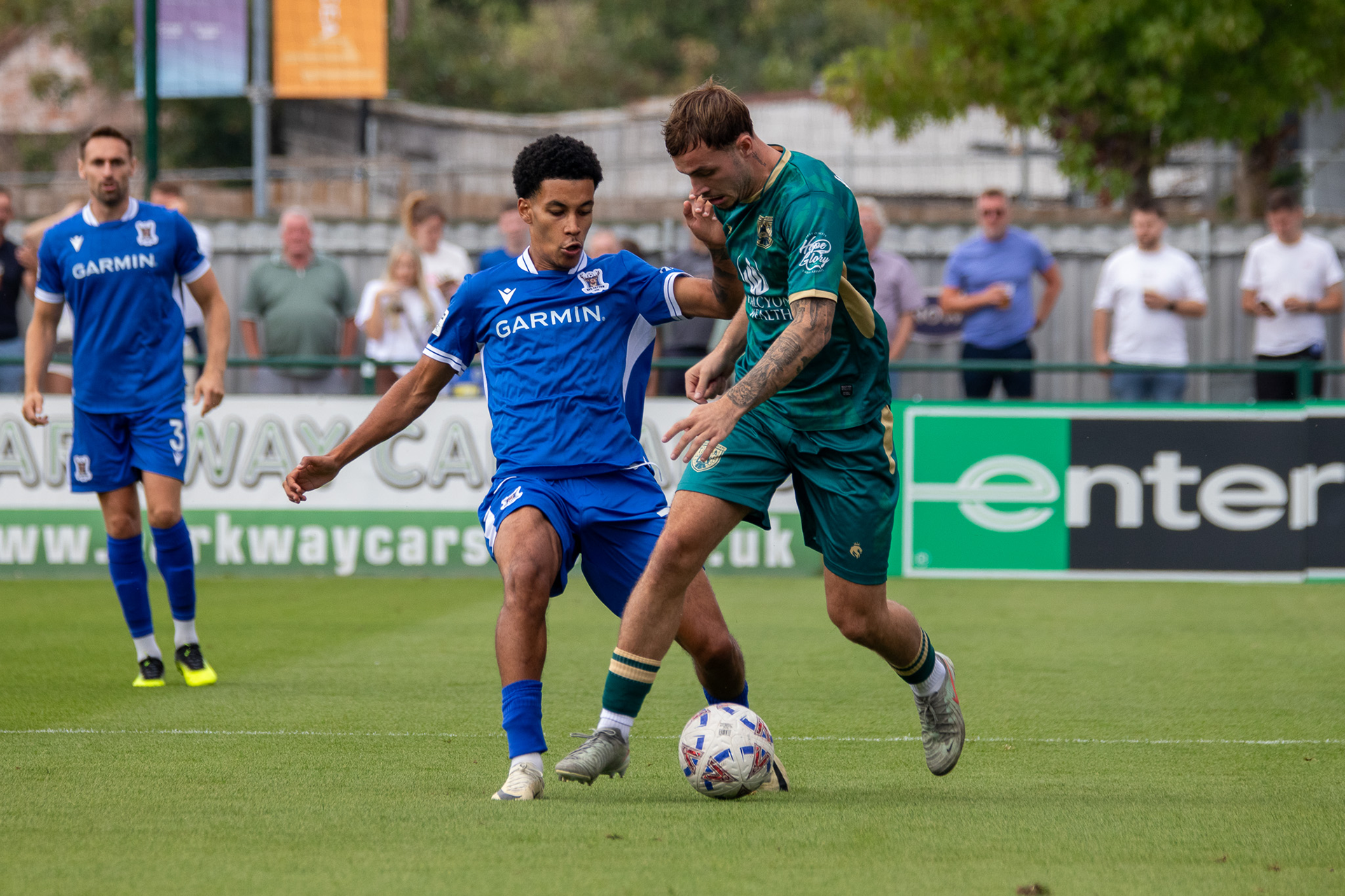 Ashley Clarke challenges for the ball.