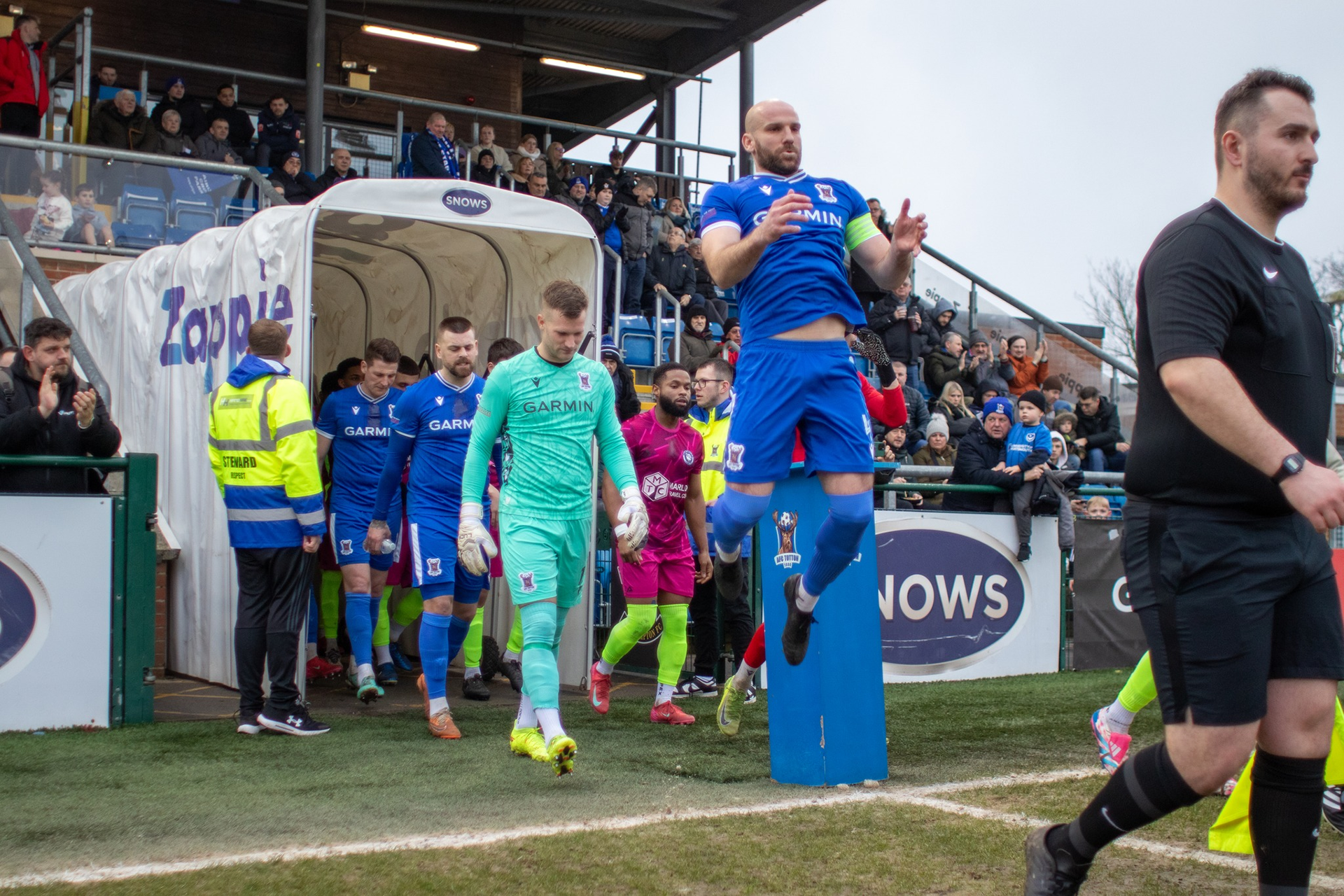 Mike Carter jumps whilst coming out of the tunnel.
