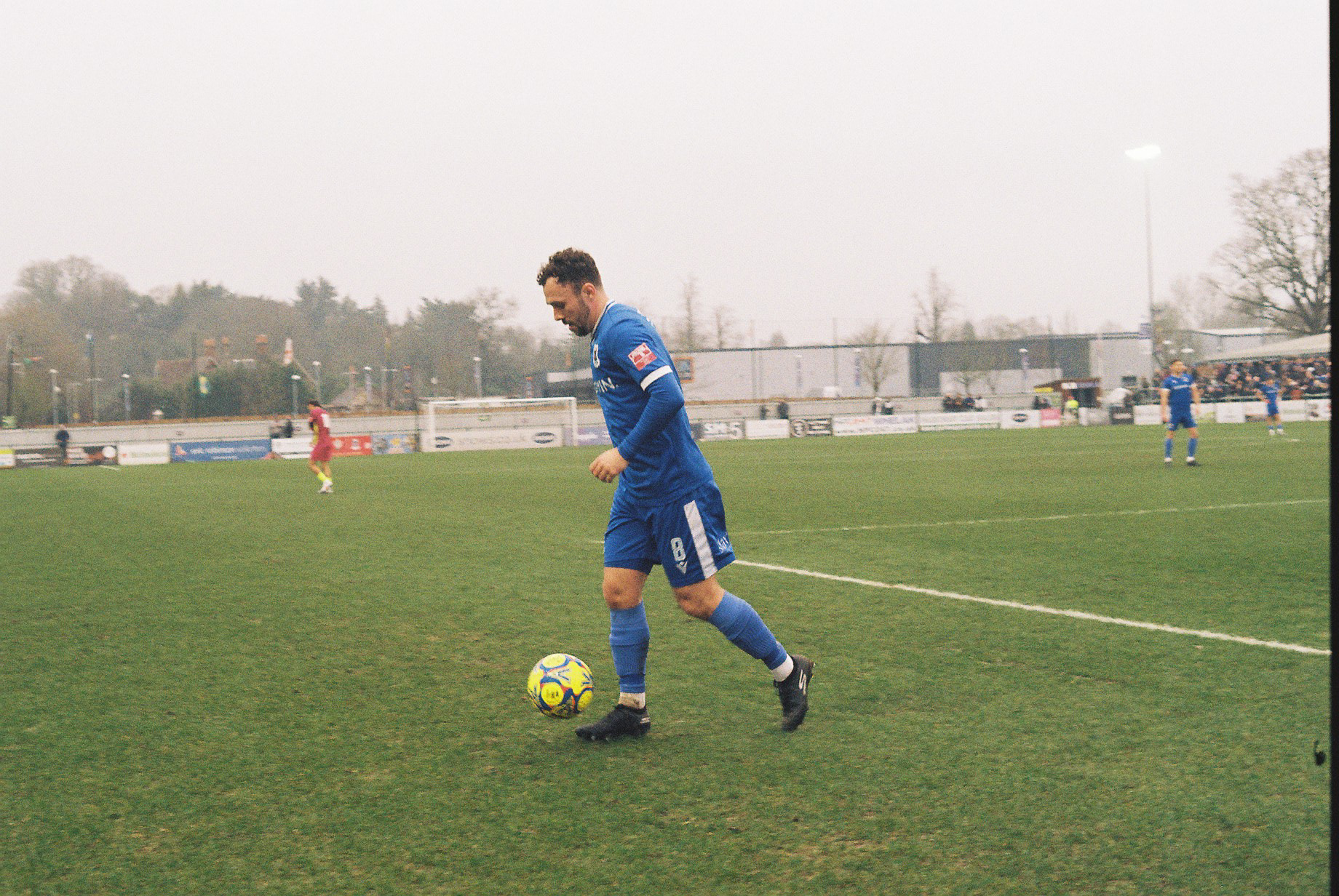 Adam Tomasso dribbling the ball.