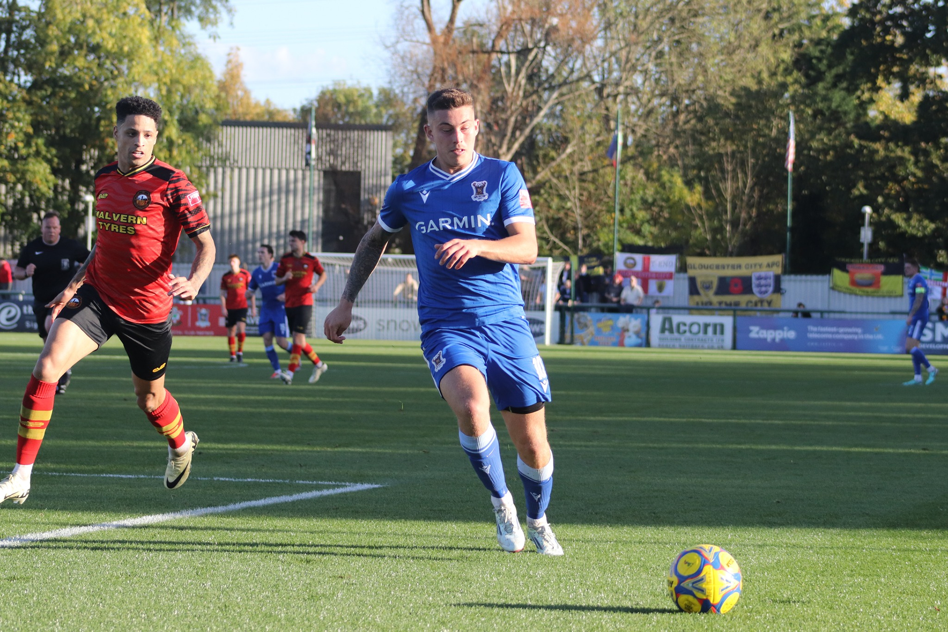 Ethan Taylor chases the ball.