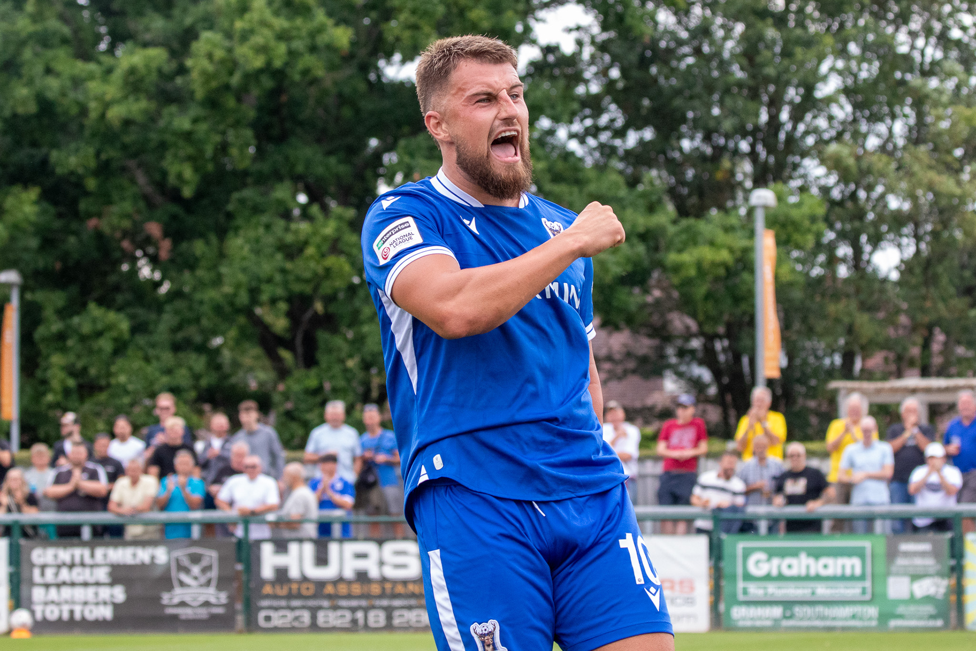 Tony Lee celebrates his goal.