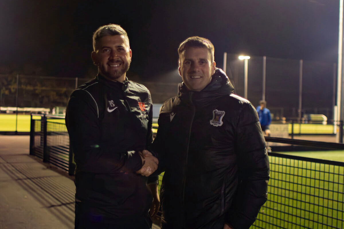 Ben Sainsbury (BRS Founder / left) and Jimmy Ball (AFC Totton First Team Manager & Academy Director / right) shaking hands.