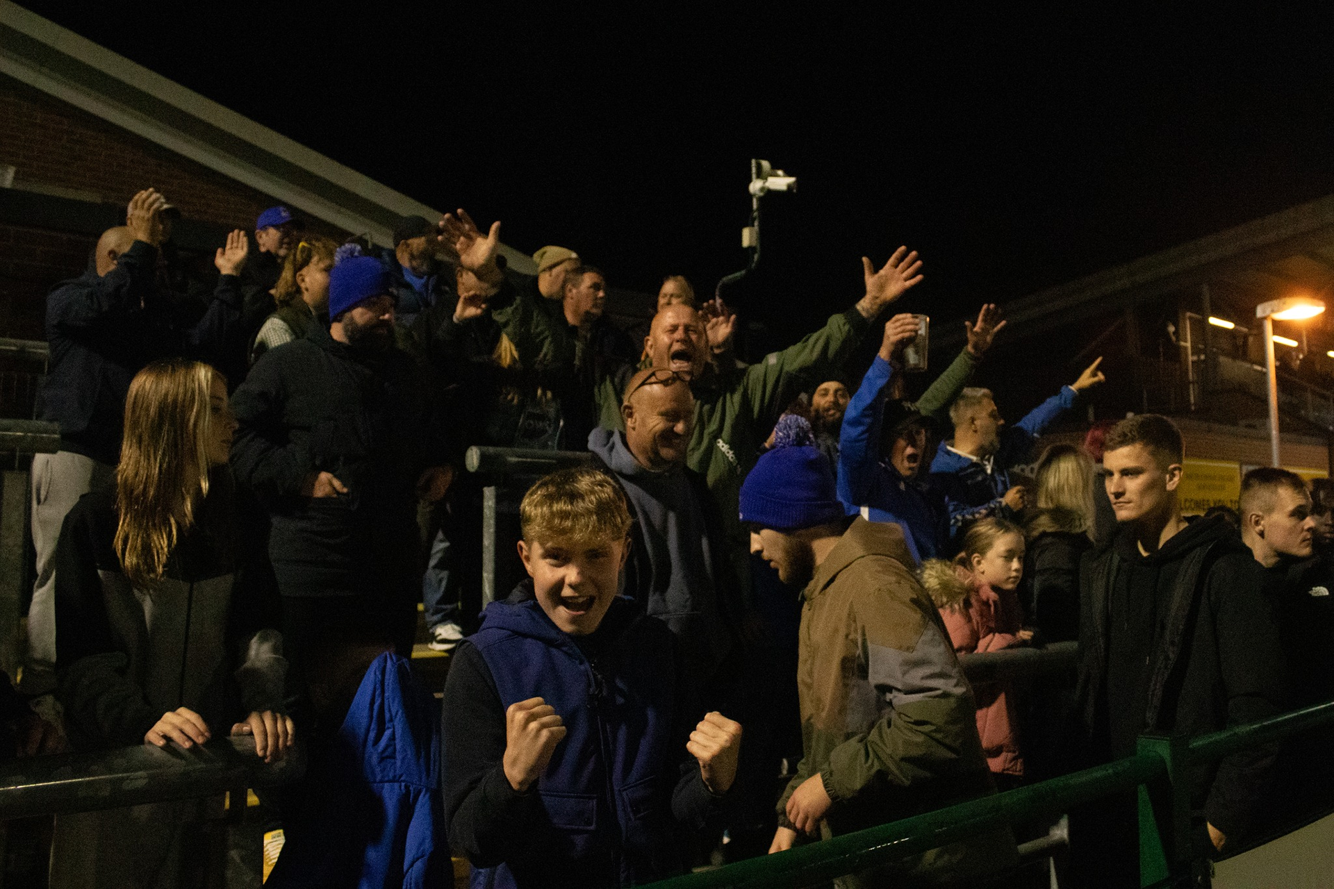 The fans celebrate their win.