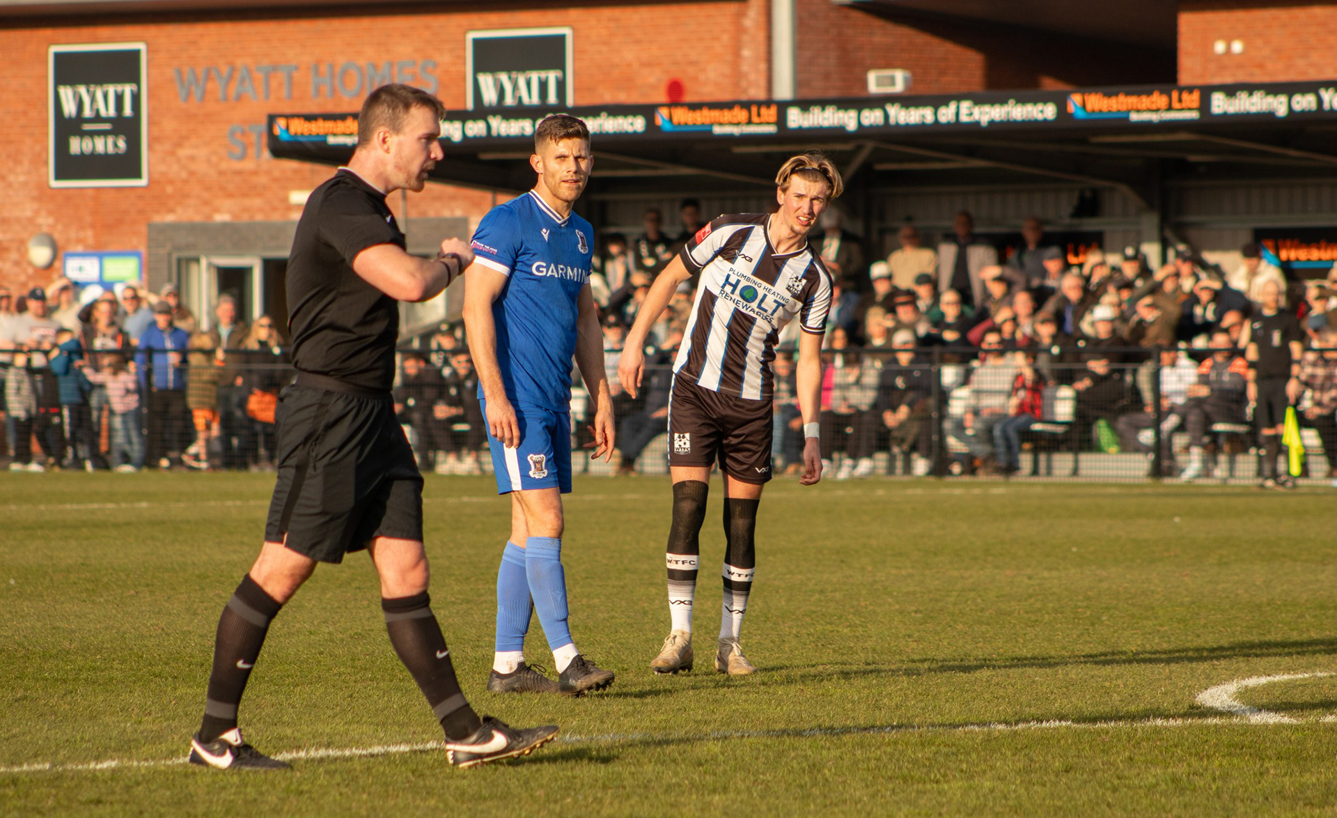 Charlie Kennedy awaits a decision from the referee.