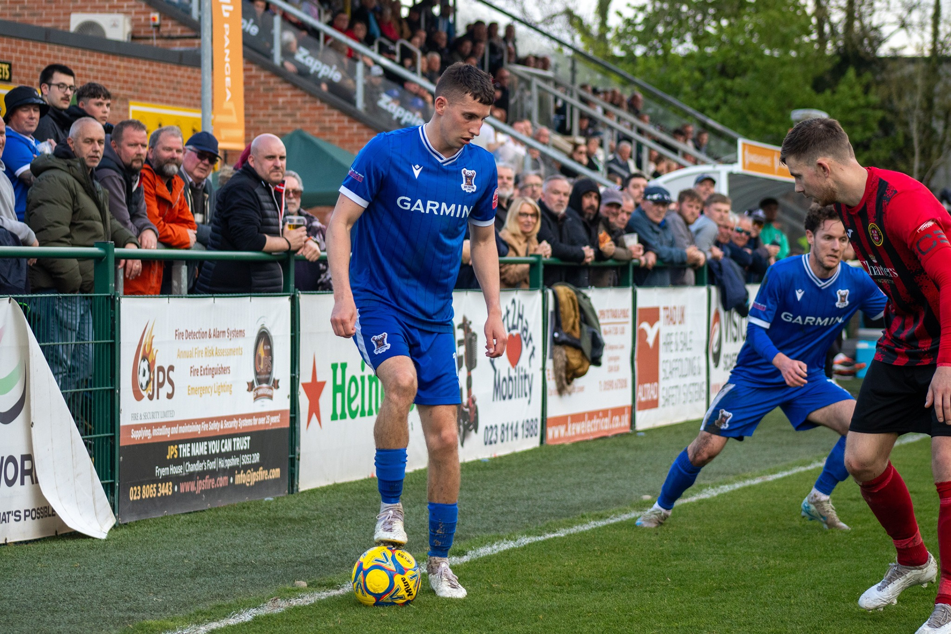 Luke Bennett holds up the ball.