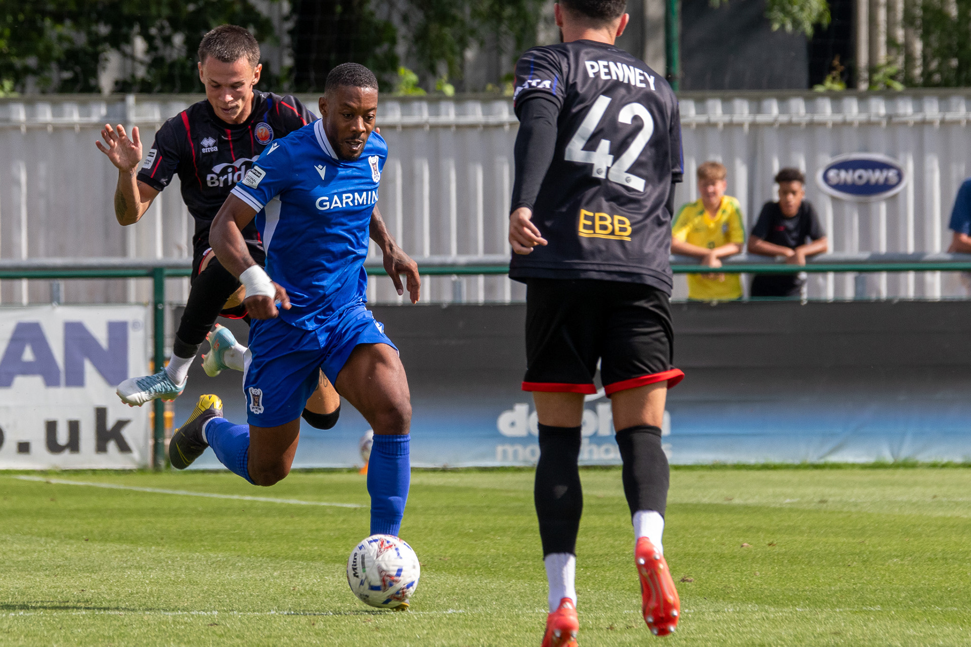Ryan Jackson beats an Aldershot Player.
