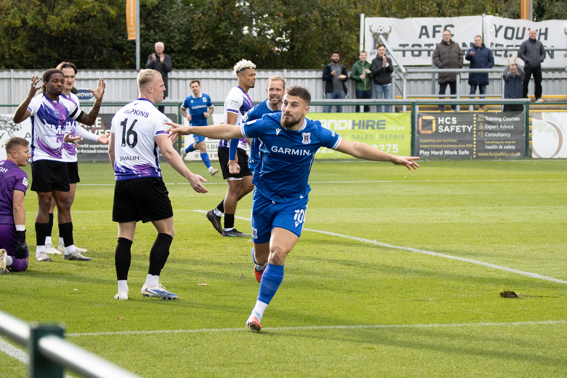 Tony Lee celebrates his goal.