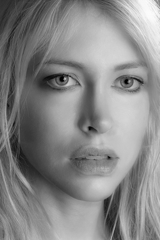 Schwarzweiß closeup  Portrait mit Fokus auf Gesicht und Ausdruck, Portraitfotograf Bremen