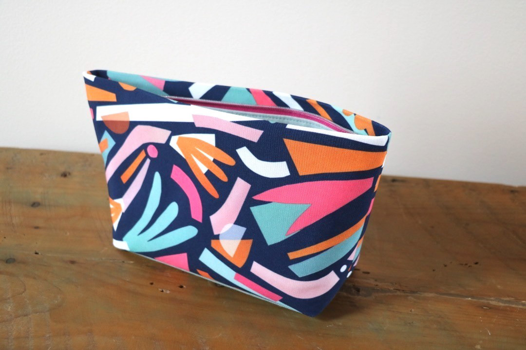 Pouch by Jordan Porter featuring "Paper Palm Paradise". Photo credit: Jordan Porter
