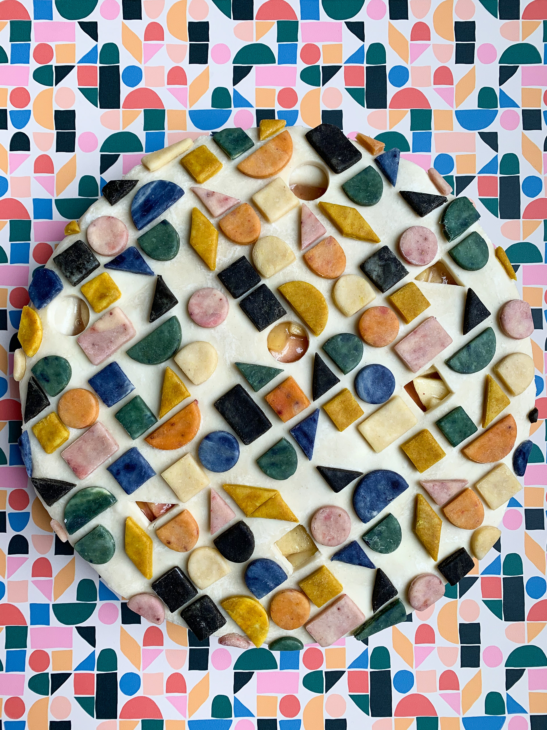 Pie by Lauren Ko inspired by "The Dog Ate My Ruler" (print in background). Photo credit: Lauren Ko. Fabric printing by Spoonflower