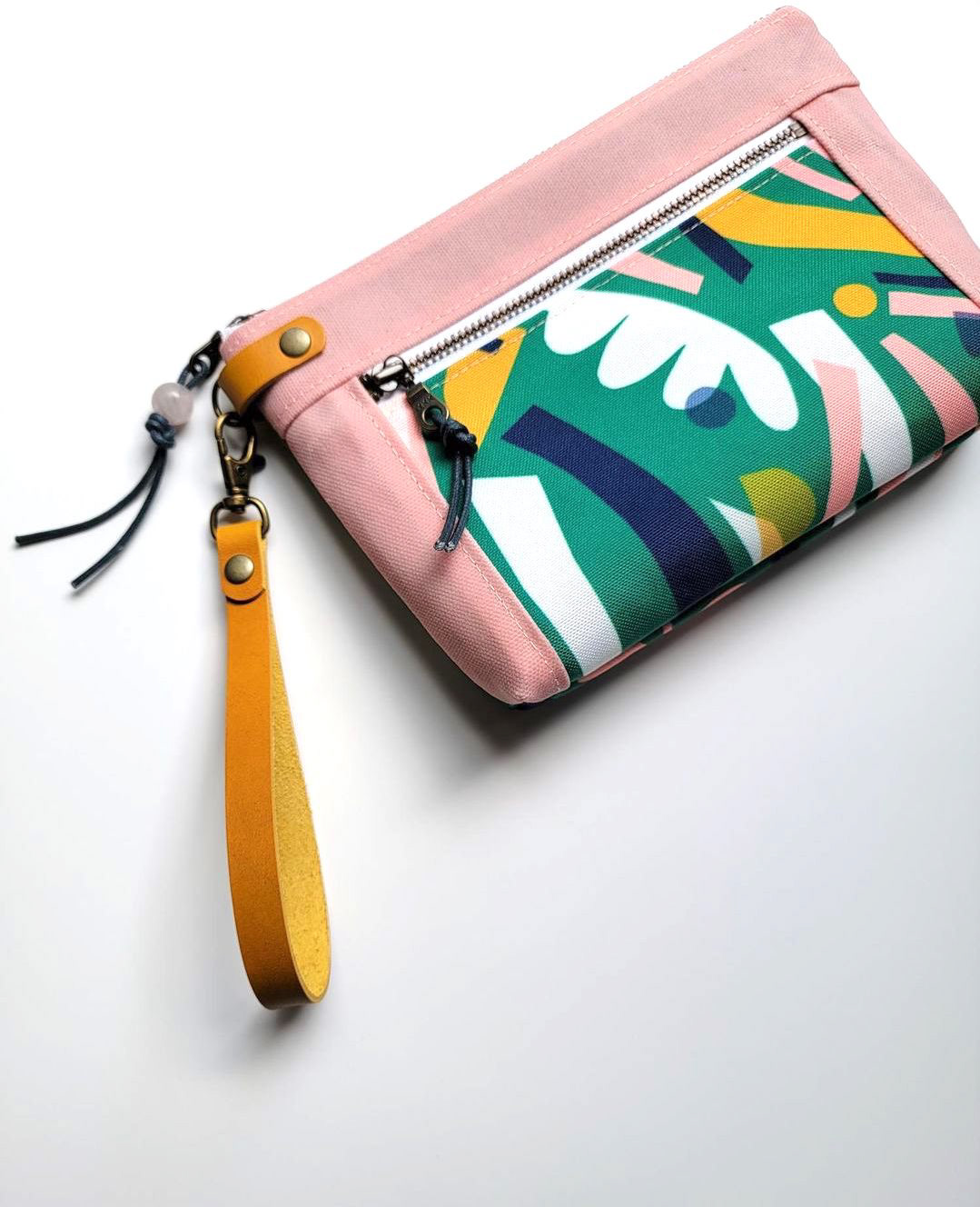 Clutch by Jordan Porter featuring "Green Flowerbed". Photo credit: Jordan Porter