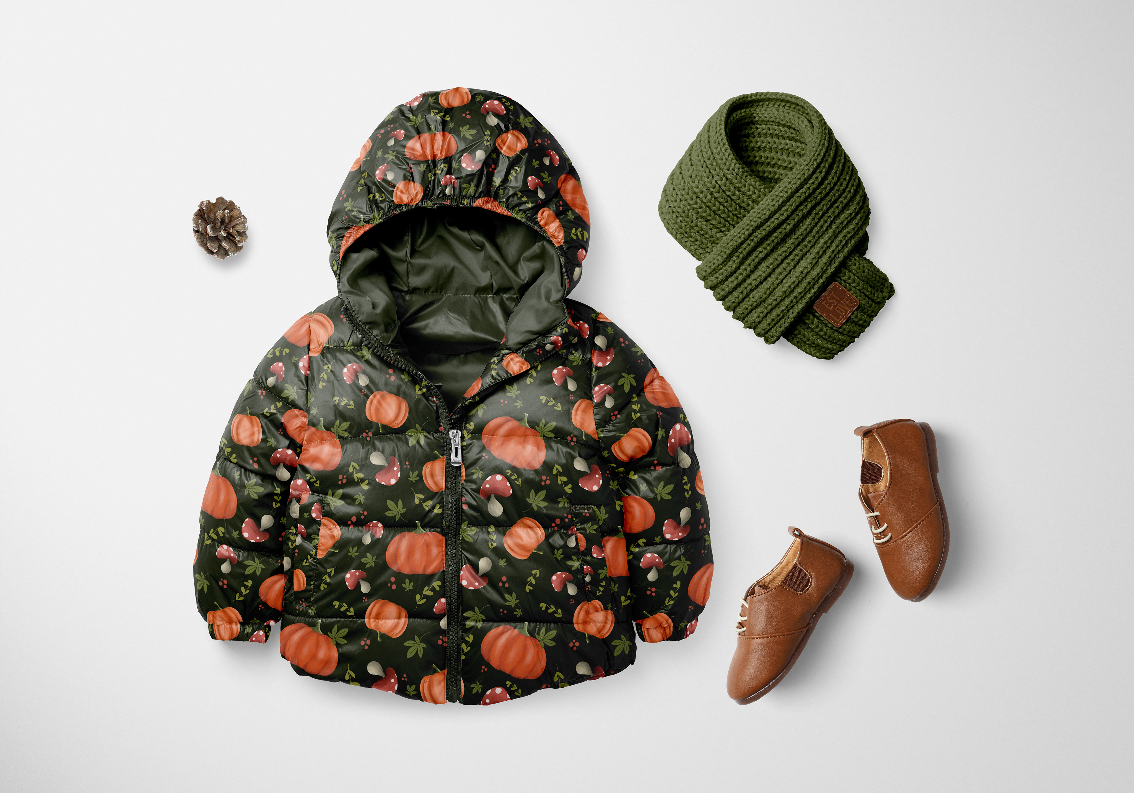 Cozy warm fall and winterjacket for toddlers, with mushroom and pumpkin print by Marlies Blokland