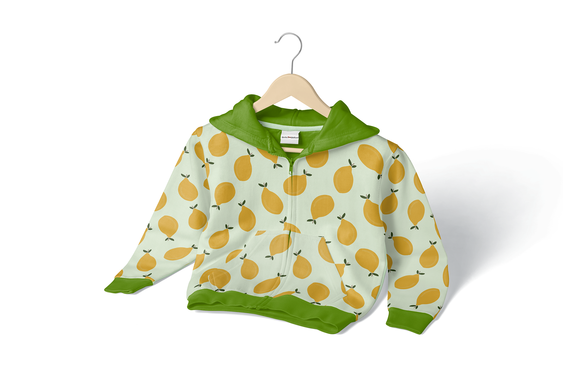 Children’s hoodie featuring a playful, retro-inspired lemon pattern by surface designer Marlies Blokland. The design includes bright yellow fruit with green leaves on a pale background, with matching green cuffs, hem, and hood lining.