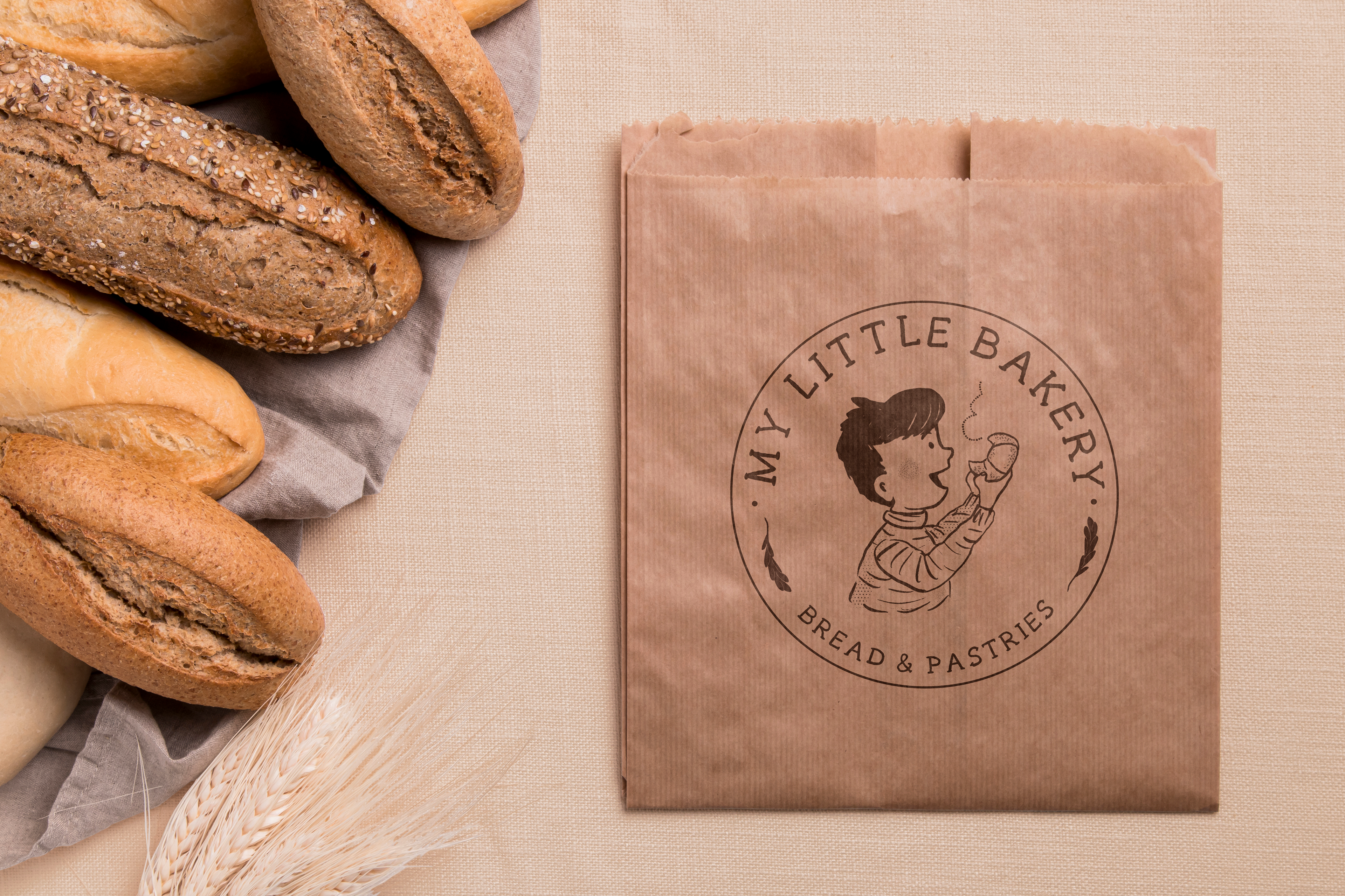 My Little Bakery logo printed on a flat kraft paper bag