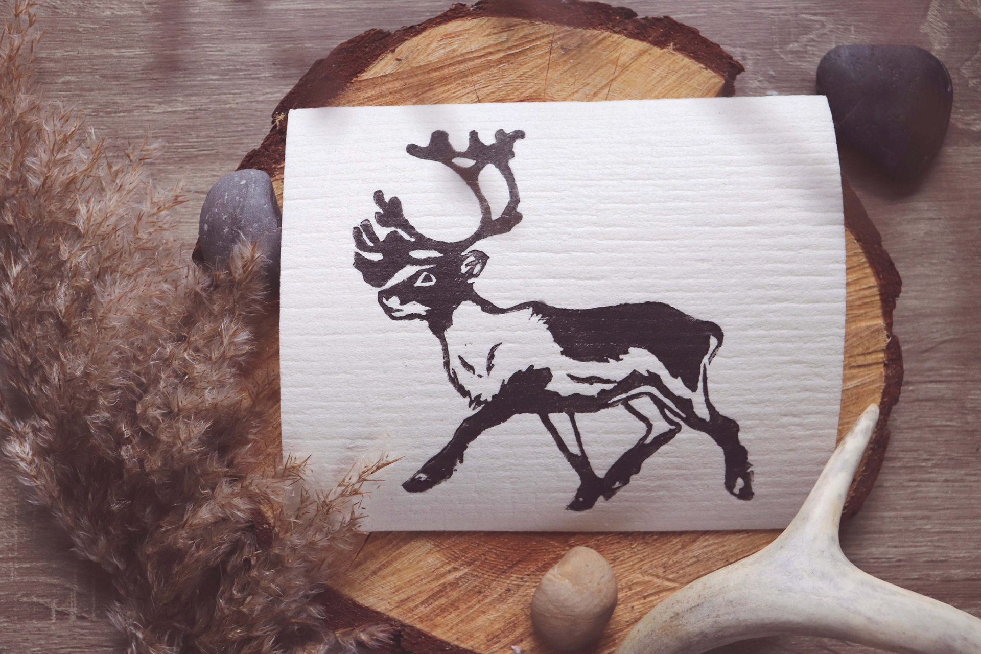 Hand carved linocut printed on a dish cloth
