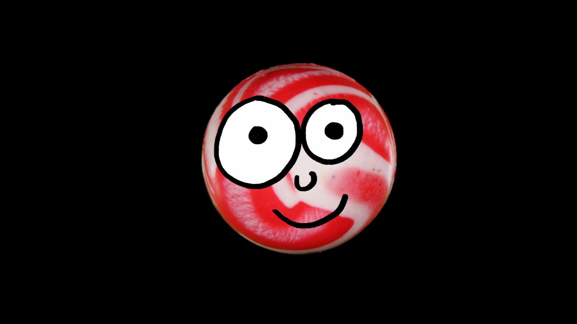 A smiling bouncy ball.