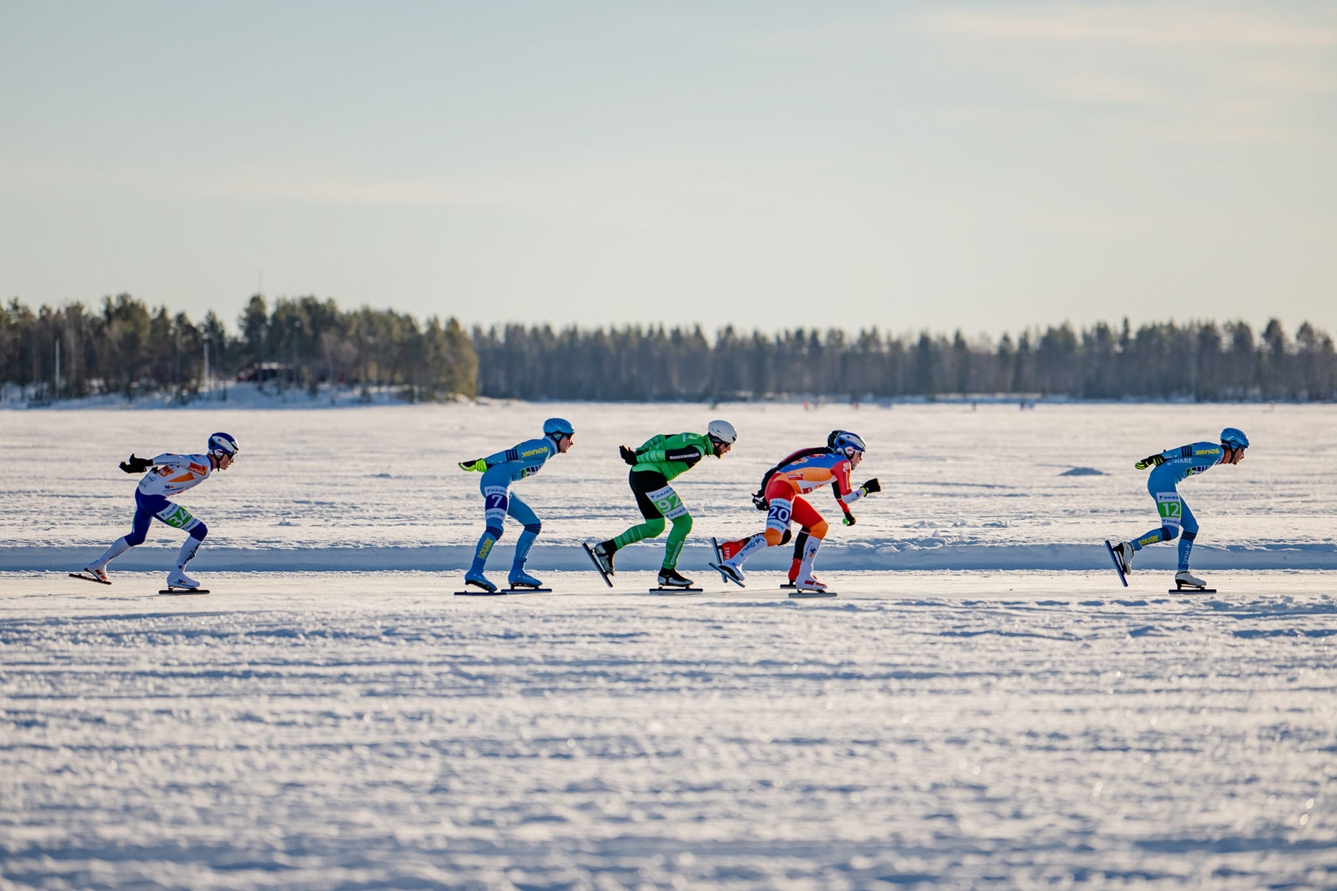 Contestants cruising through ice at the Frozen Sea at Lulea, Sweden for Schaatsen Luleå