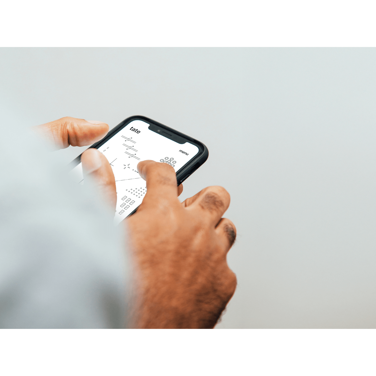 A mobile phone showing a website for a construction company