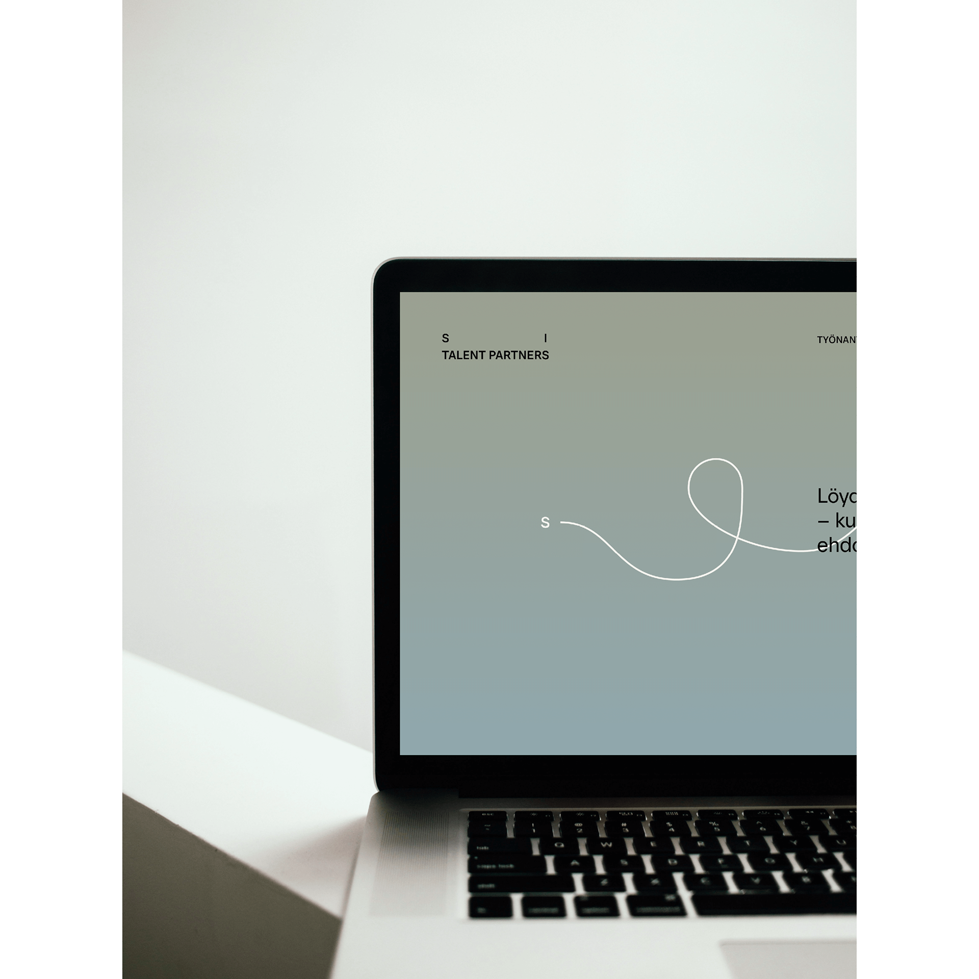 A laptop showing a website for a recruitment agency