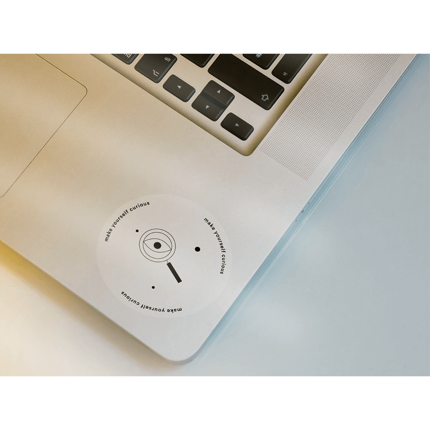 A sticker for a biotech startup on a laptop