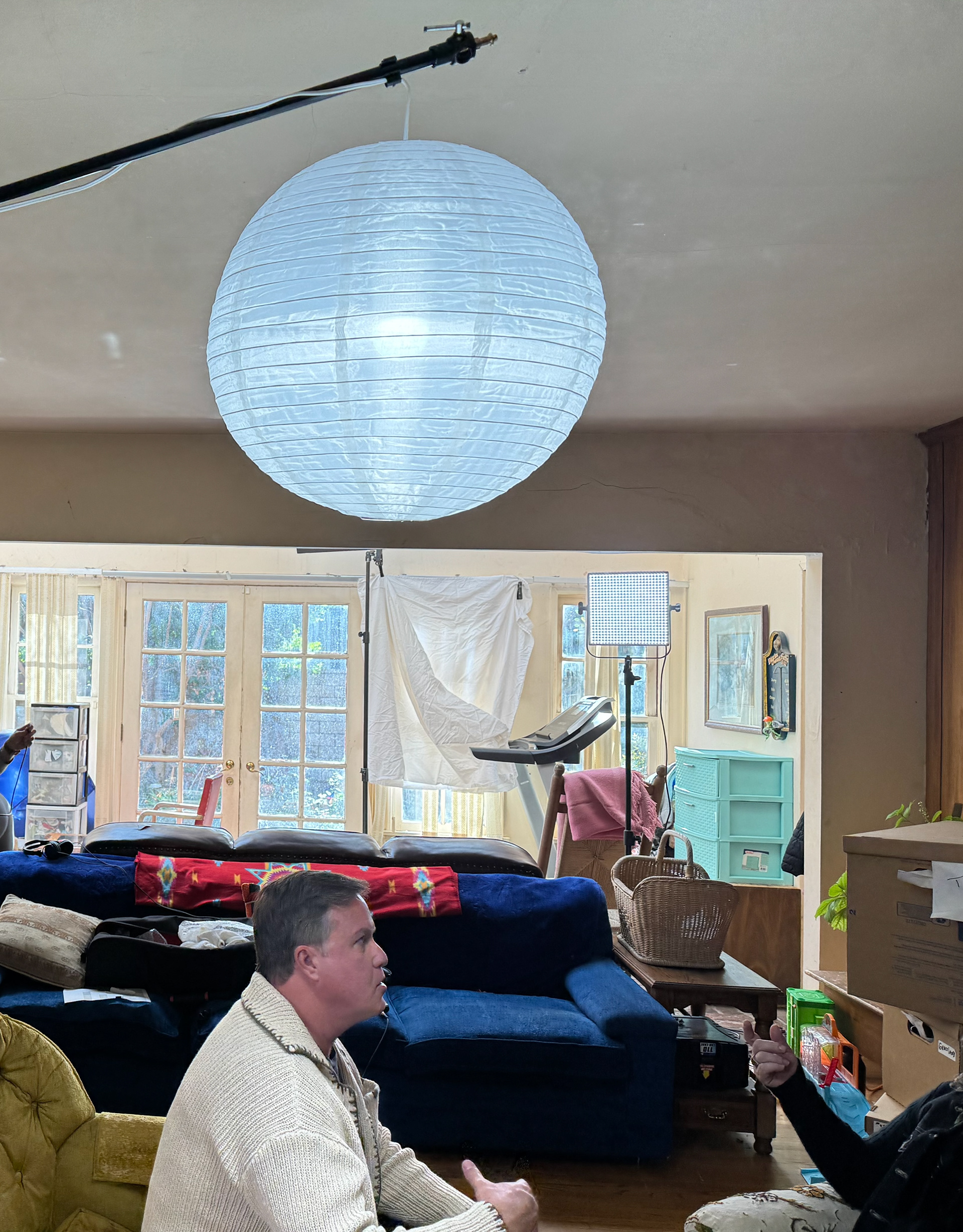 Lighting the set and rehearsing the actors.